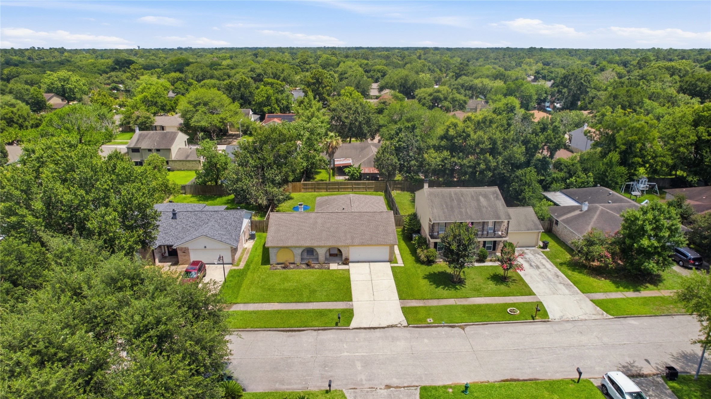 4019 Postwood Drive Spring, TX 77388 - Photo 43 of 50 an aerial view of residential houses with outdoor space and street view