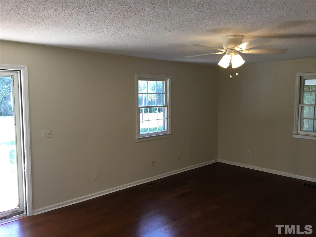 689 Silas Moore Road Coats, NC 27521 - Photo 3 of 17 a view of a livingroom with a window