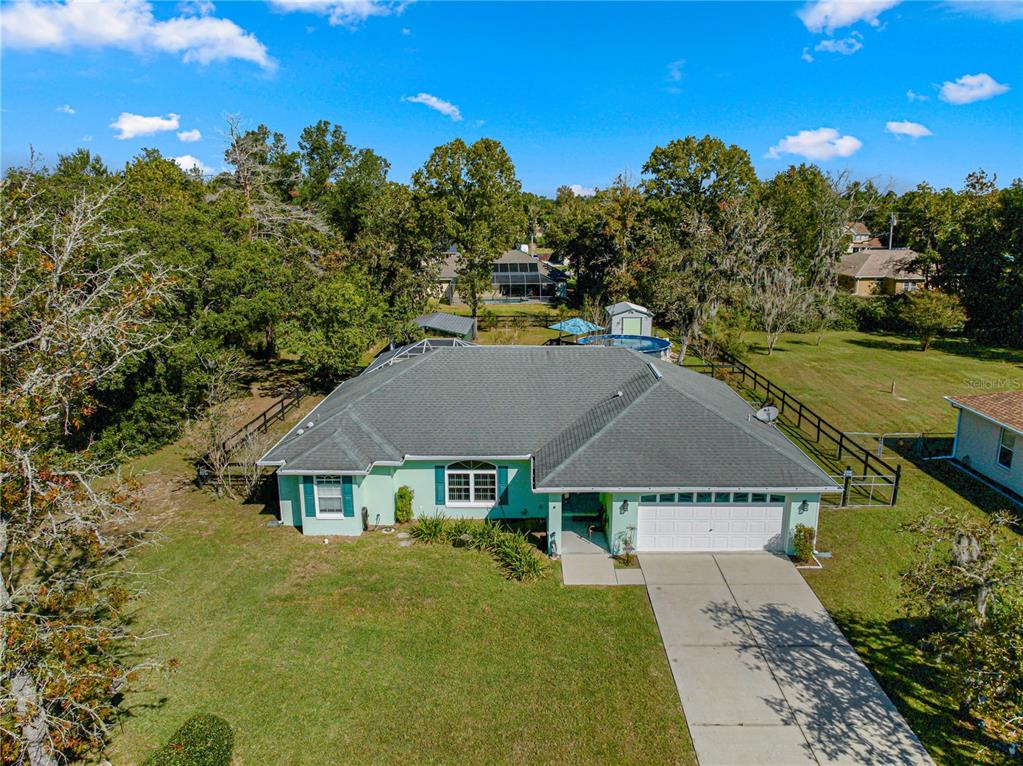 11339 Southwest 58th Circle Ocala, FL 34476 - Photo 1 of 1 an aerial view of a house
