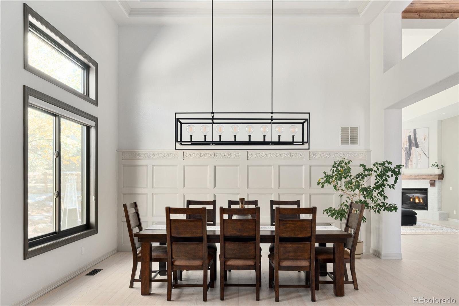 20132 East Shady Ridge Road Parker, CO 80134 - Photo 12 of 50 a view of a dining room with furniture and window