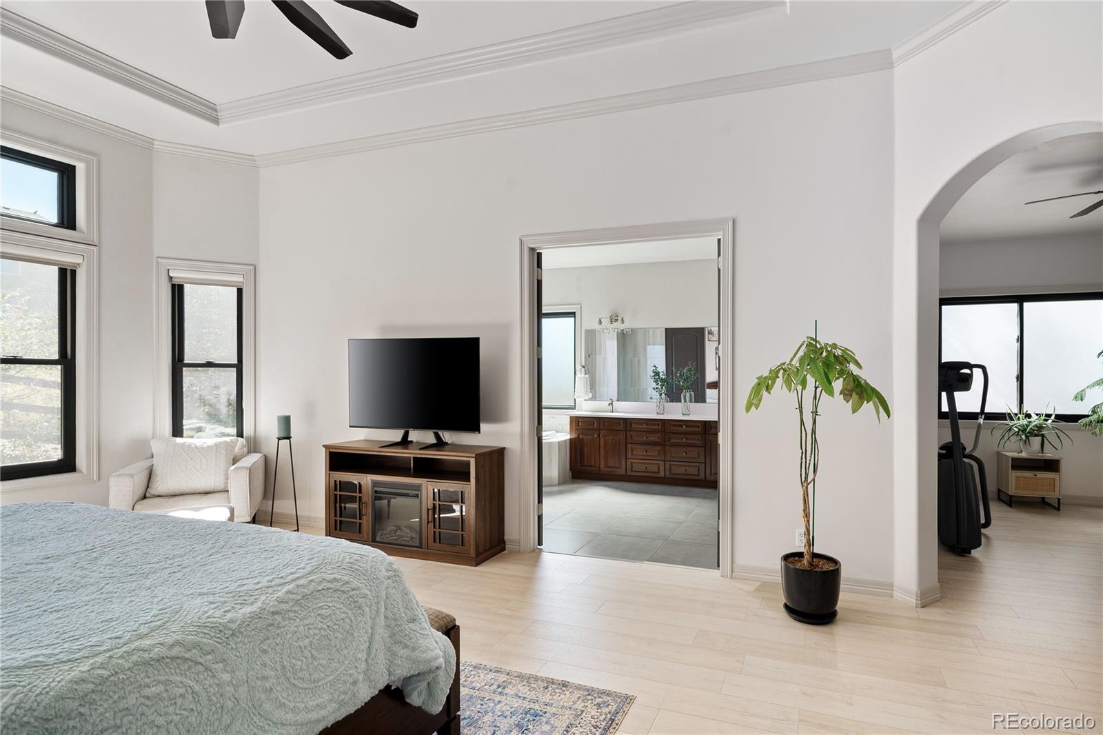 20132 East Shady Ridge Road Parker, CO 80134 - Photo 20 of 50 a living room with furniture and a flat screen tv
