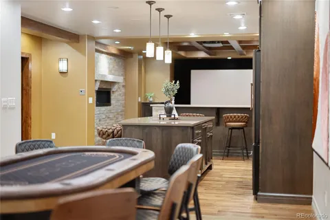 a kitchen with a table and chairs in it