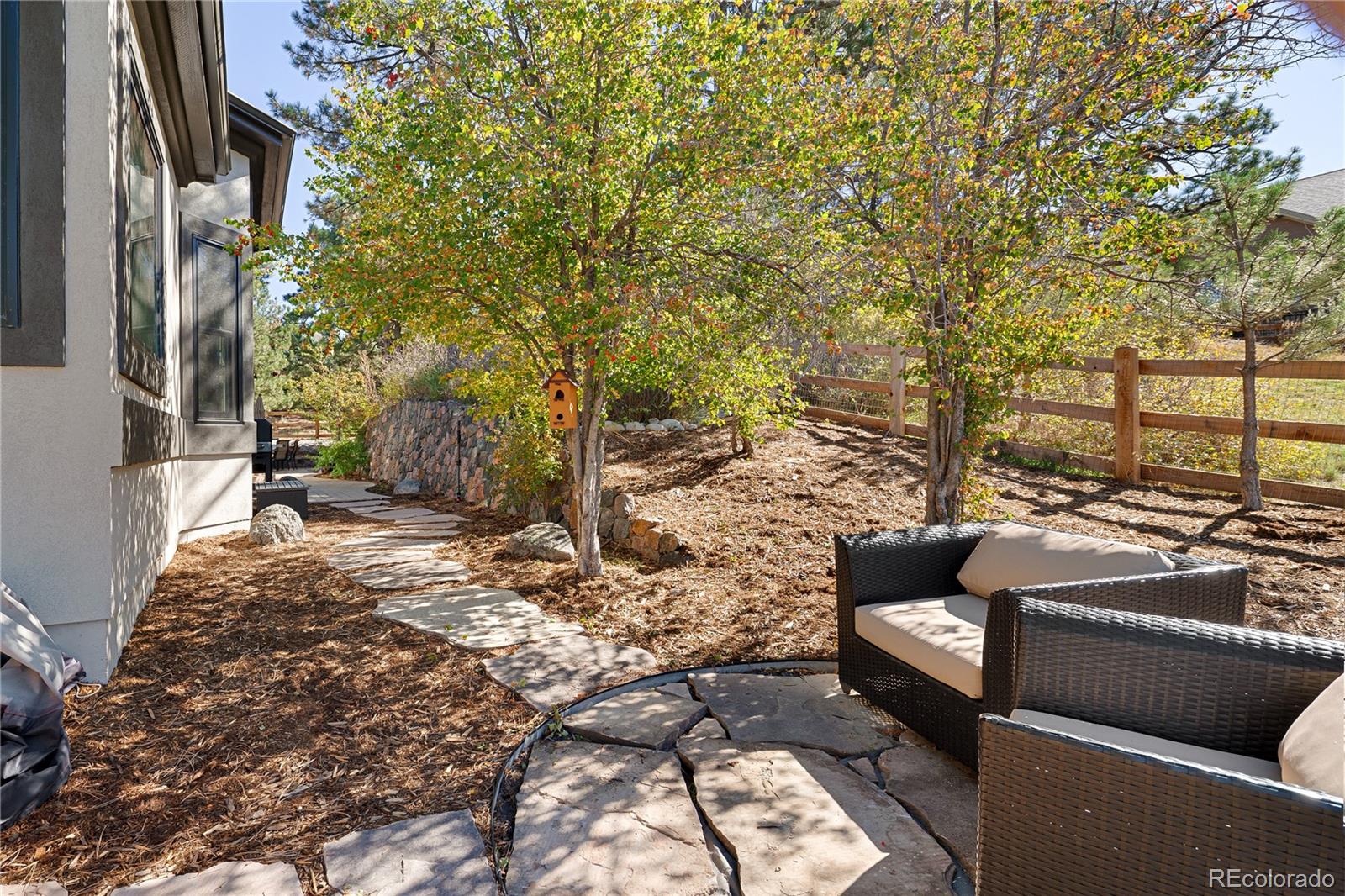 20132 East Shady Ridge Road Parker, CO 80134 - Photo 40 of 50 a outdoor living space with patio furniture