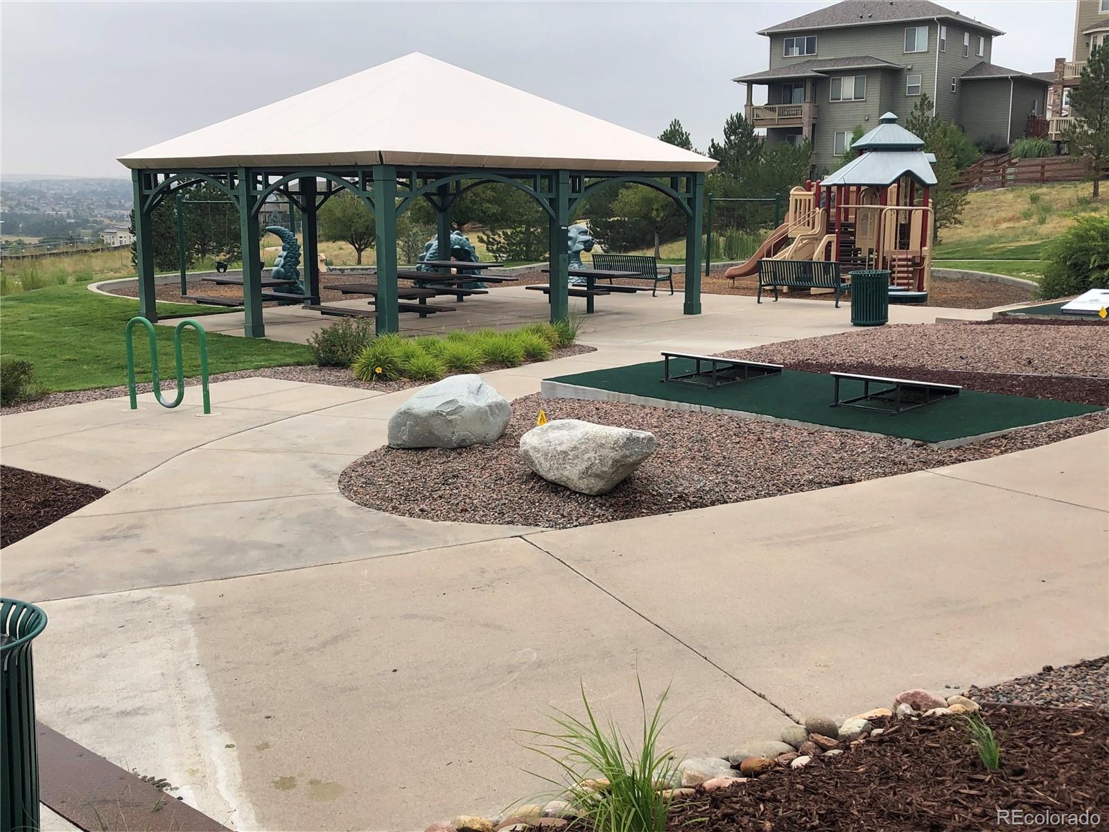 20132 East Shady Ridge Road Parker, CO 80134 - Photo 49 of 50 a view of outdoor space yard deck patio and swimming pool