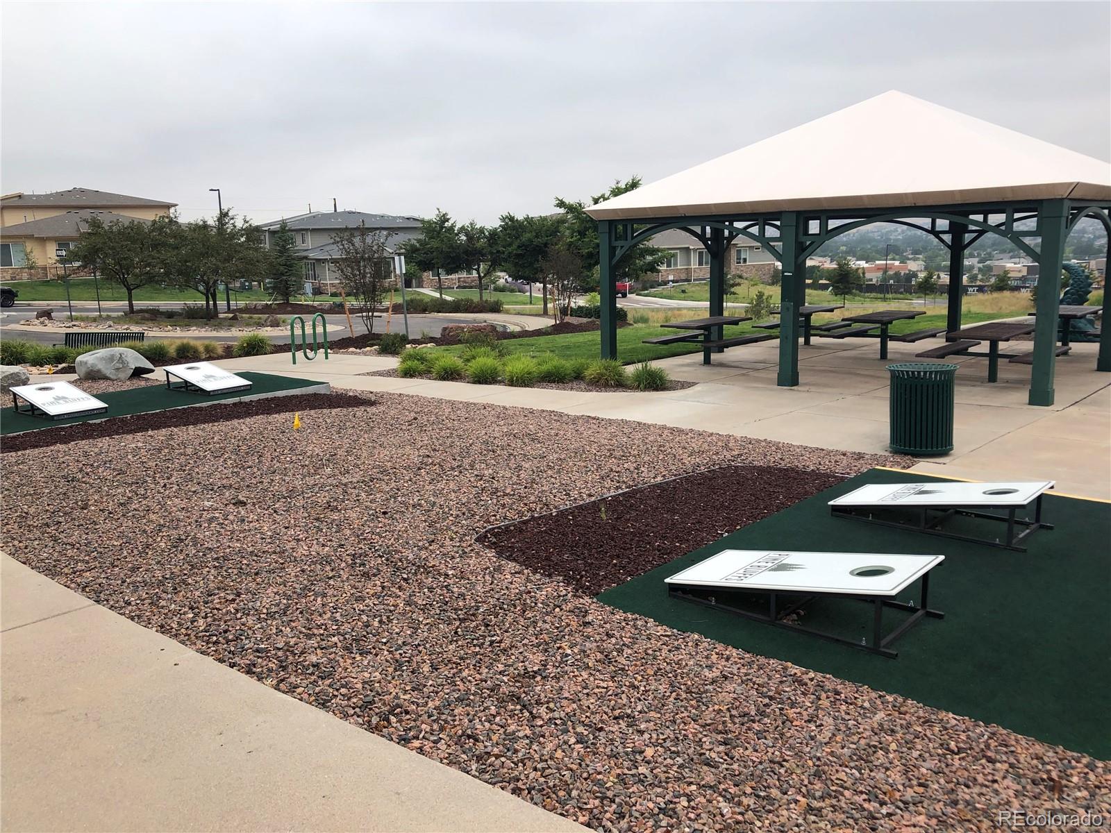 20132 East Shady Ridge Road Parker, CO 80134 - Photo 50 of 50 a view of swimming pool with outdoor seating and a yard