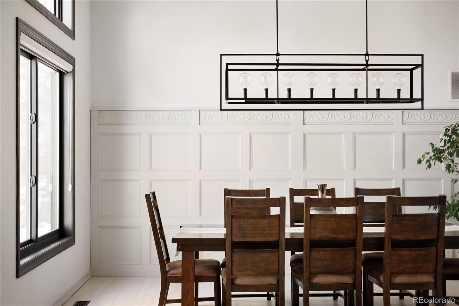 20132 East Shady Ridge Road Parker, CO 80134 - Photo 9 of 50 a view of a dining room with furniture and window