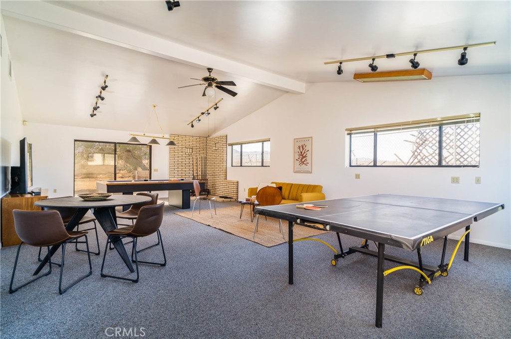 61191 Wilson Terrace Joshua Tree, CA 92252 - Photo 20 of 29 a room with furniture pool table and windows