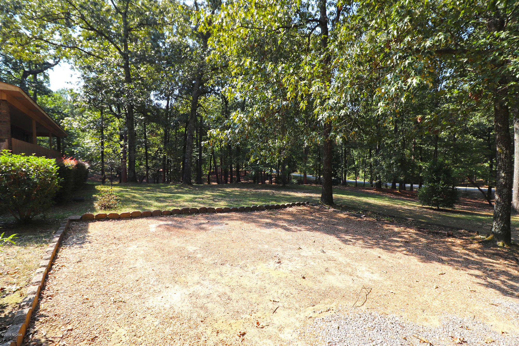 231 Red Oak Road Byron, GA 31008 - Photo 22 of 42 a view of a yard with trees