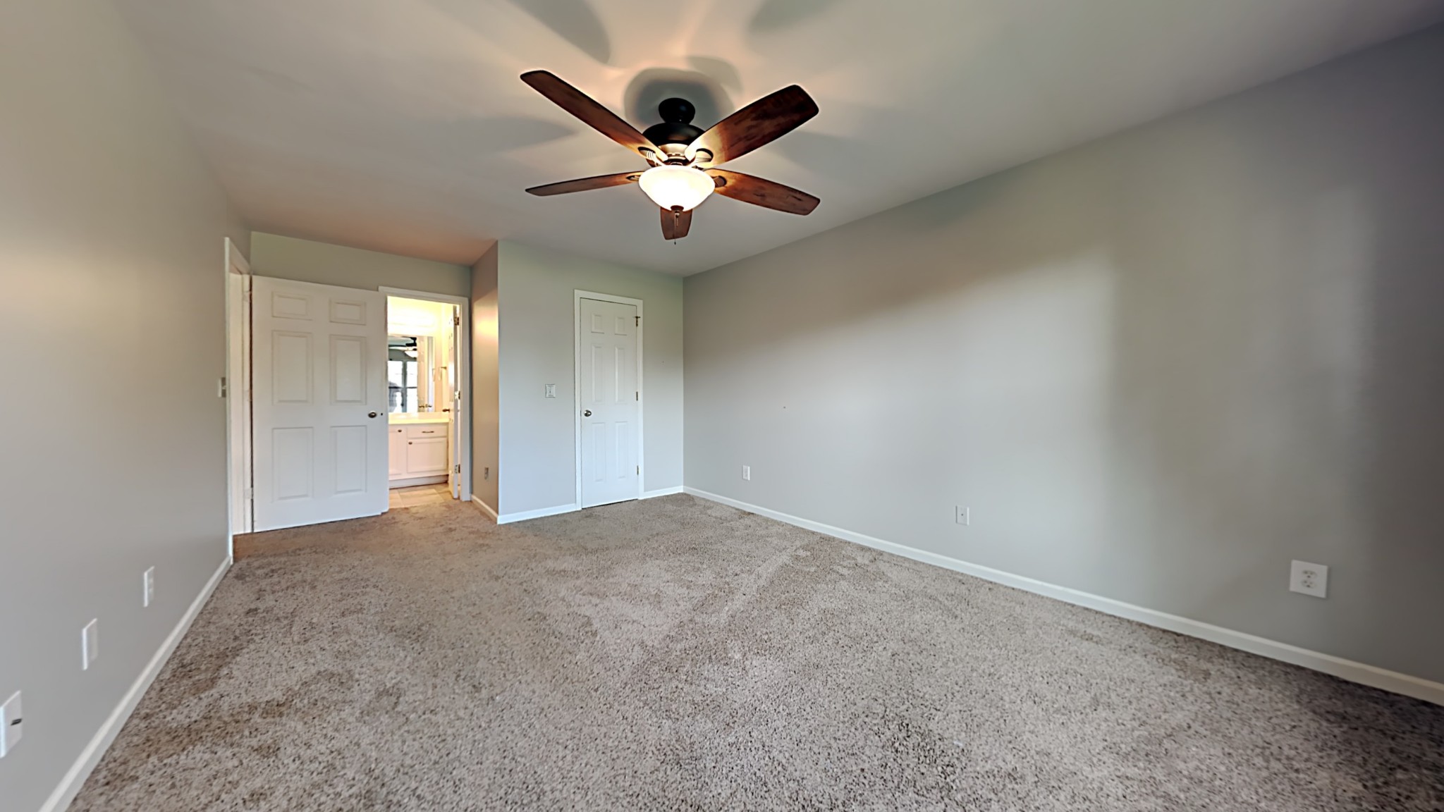 7528 Cherokee Hills Road Fairview, TN 37062 - Photo 7 of 22 an empty room with closet and a chandelier fan