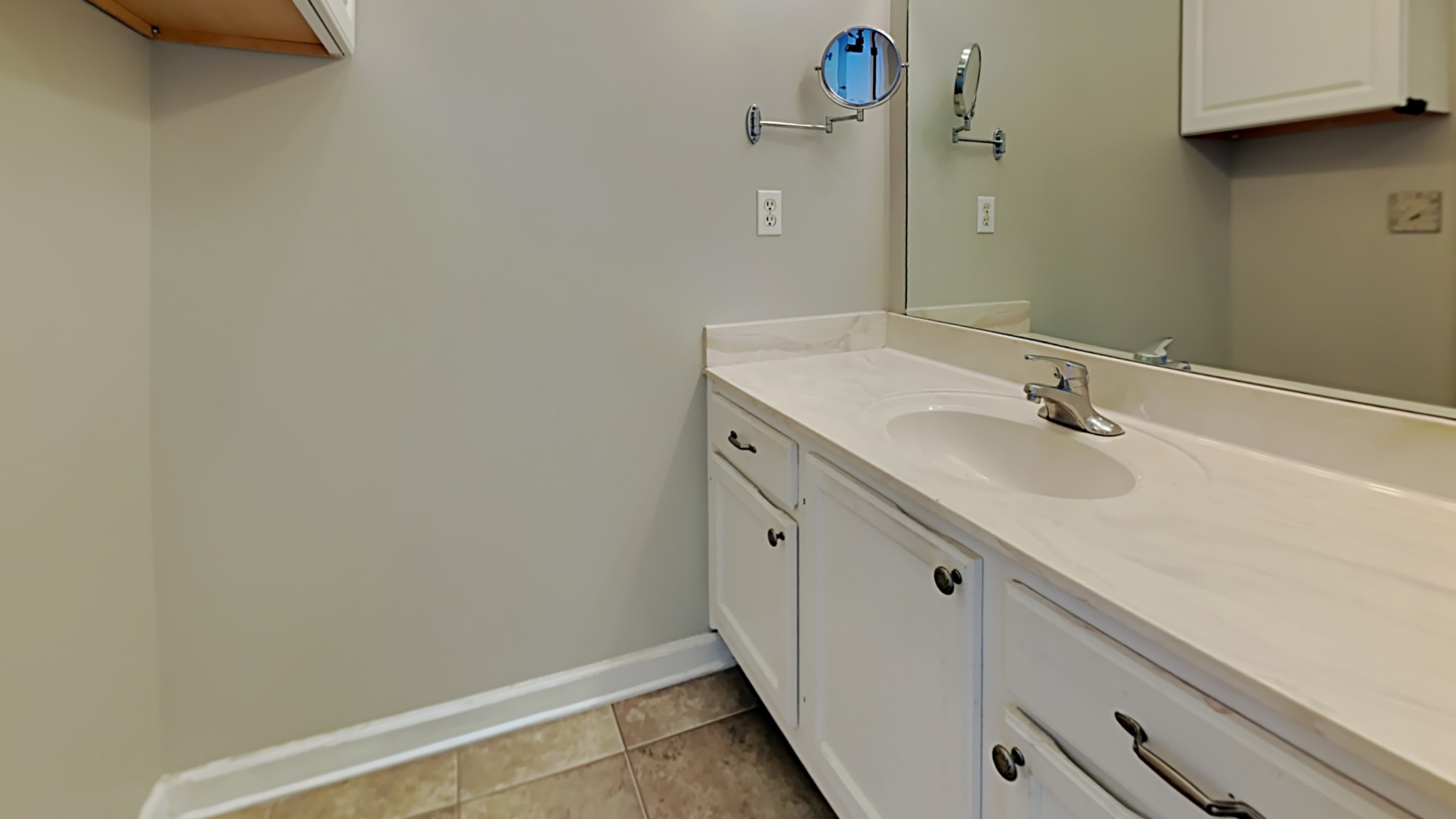 7528 Cherokee Hills Road Fairview, TN 37062 - Photo 9 of 22 a bathroom with a sink and a mirror