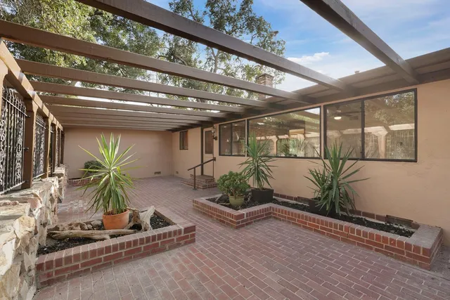 a backyard of a house with lots of green space