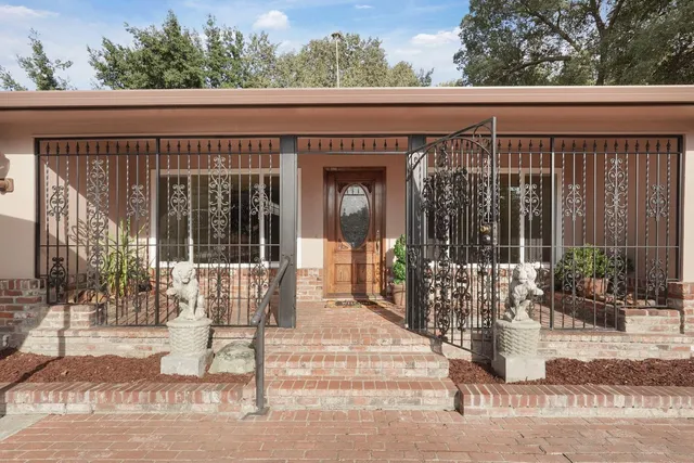 a building outdoor space with glass windows and yard