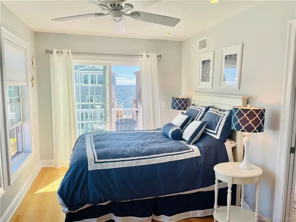 a bed room with furniture and a window