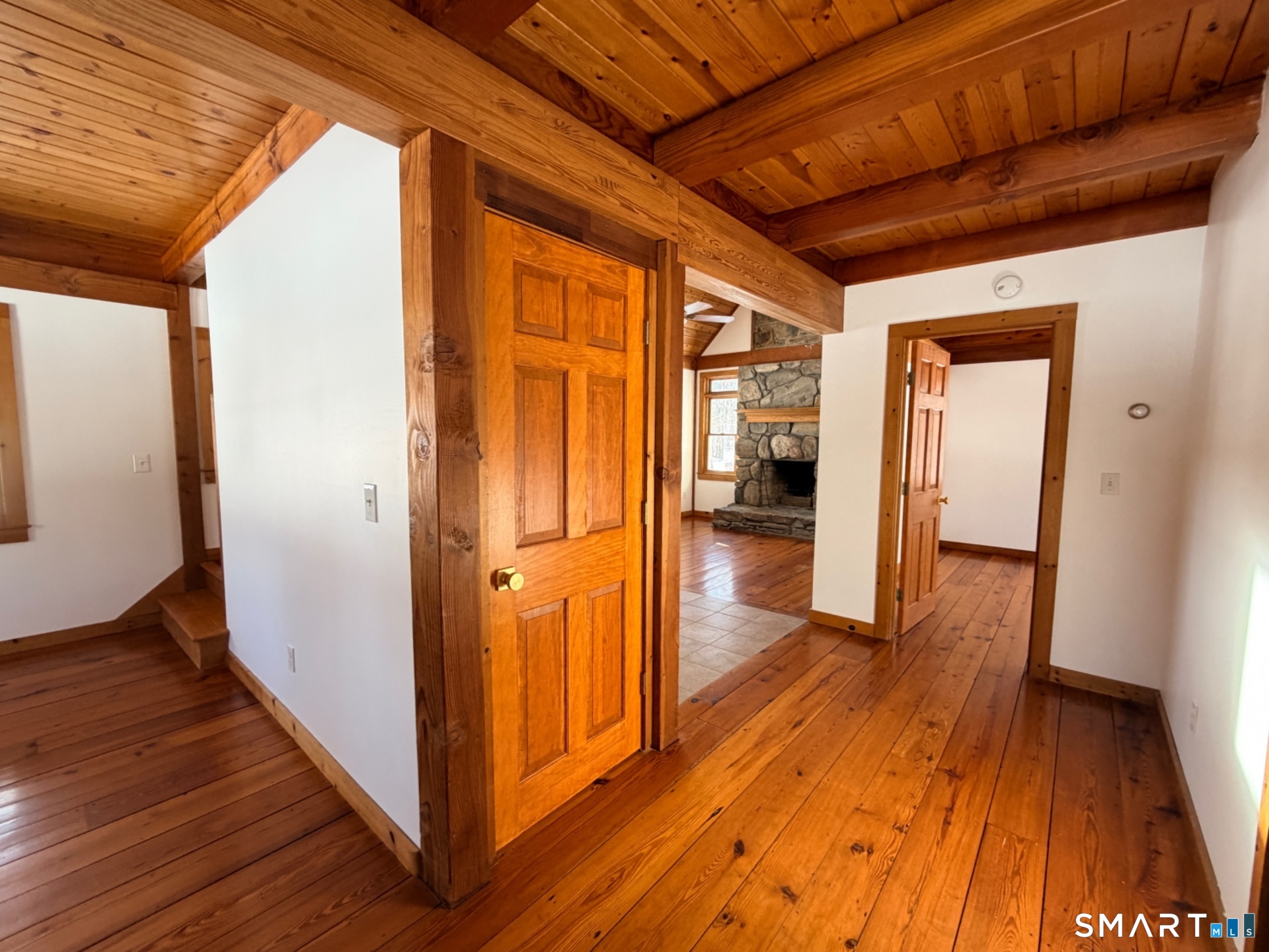 249 Woodbury Road Washington, CT 06793 - Photo 5 of 23 a view of hallway with wooden floor