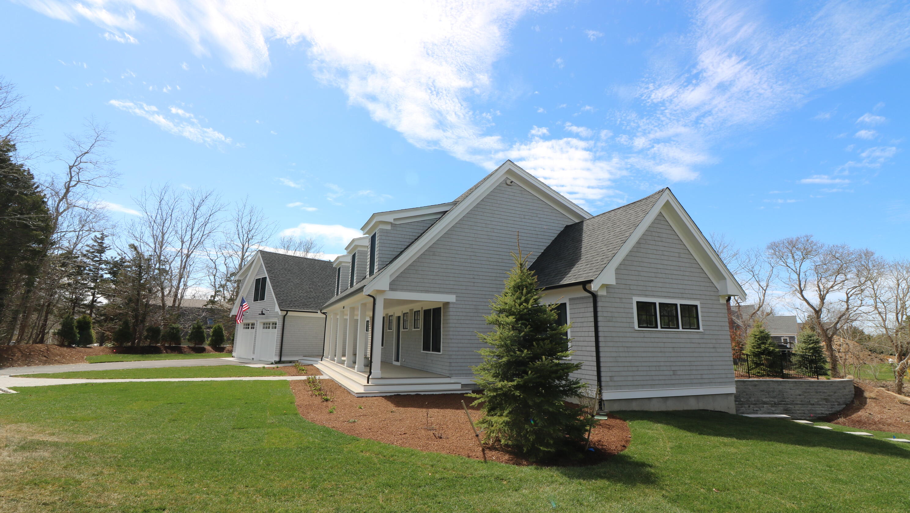 264 Tonset Road Orleans, MA 02653 - Photo 11 of 92 a front view of house with a garden