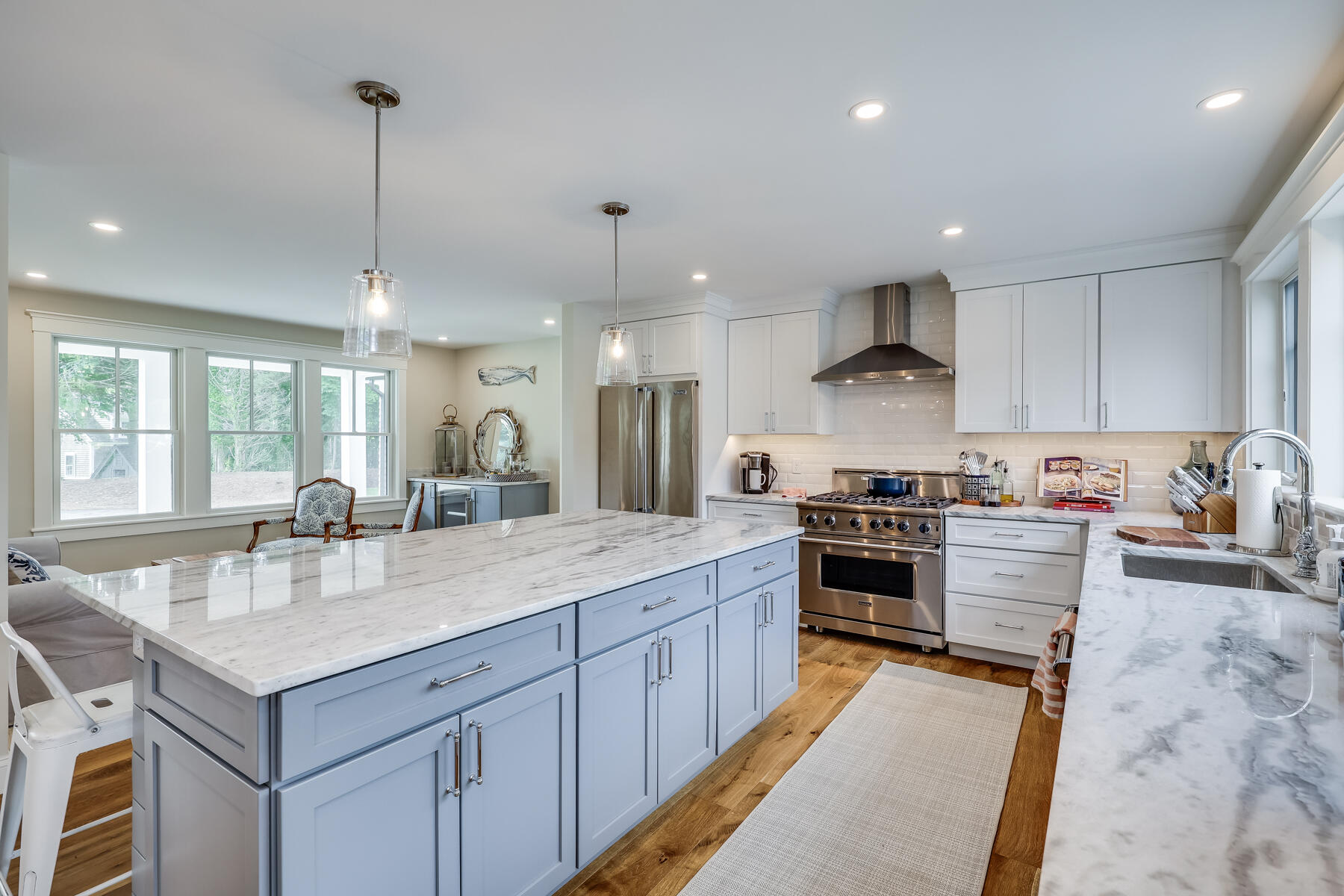 264 Tonset Road Orleans, MA 02653 - Photo 18 of 92 a kitchen with kitchen island granite countertop lots of counter top space and stainless steel appliances