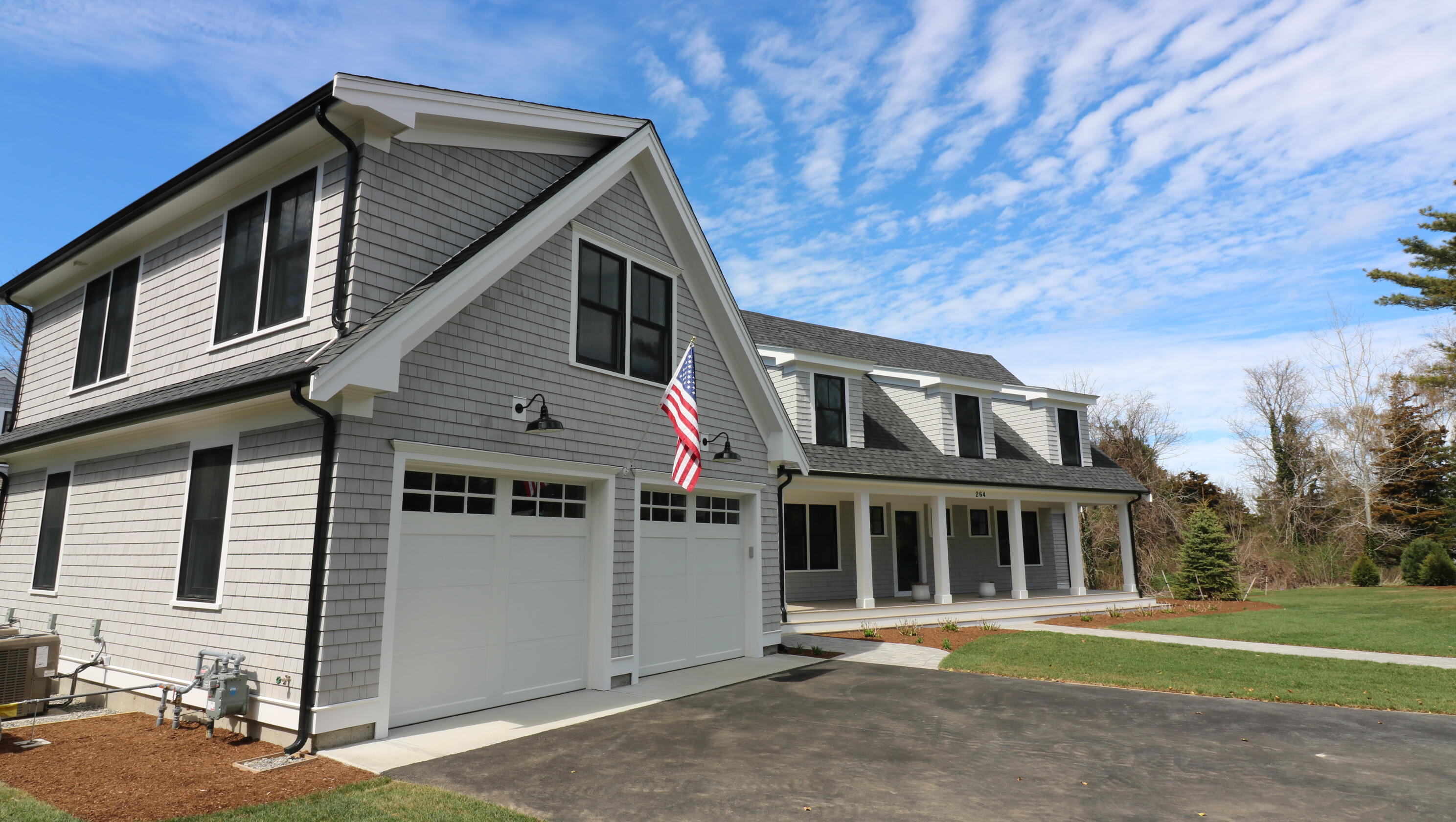 264 Tonset Road Orleans, MA 02653 - Photo 4 of 92 a front view of a house with a yard