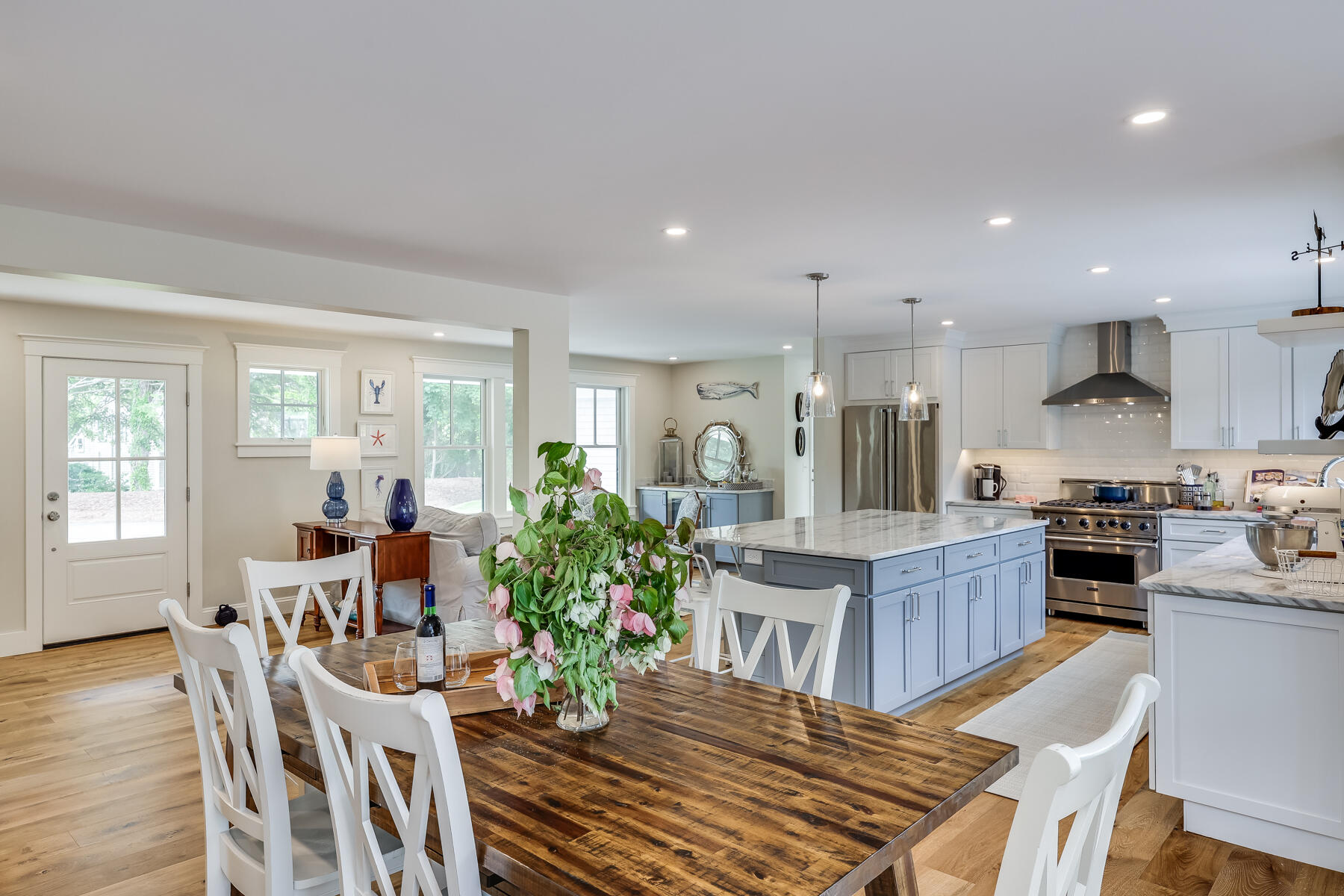 264 Tonset Road Orleans, MA 02653 - Photo 41 of 92 a view of a dining room with furniture window and wooden floor