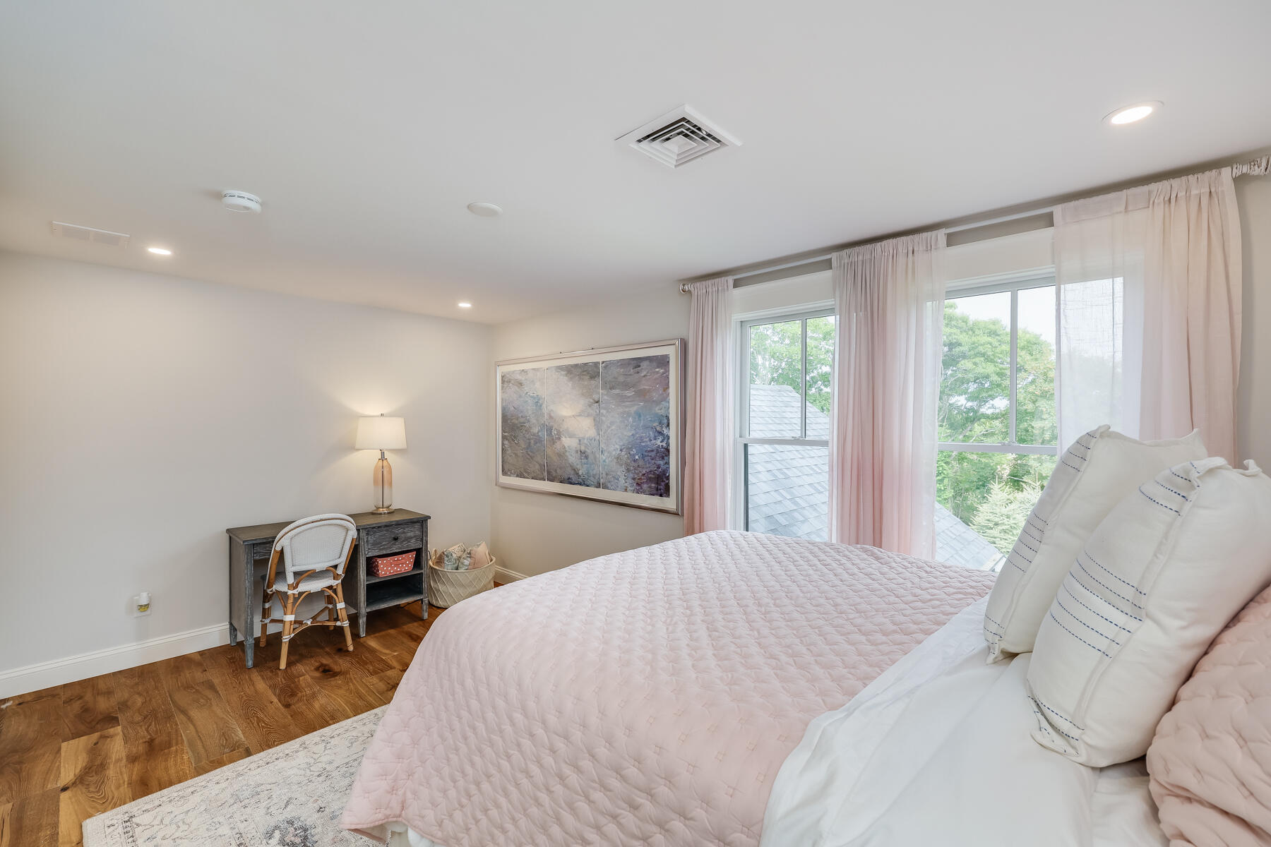 264 Tonset Road Orleans, MA 02653 - Photo 55 of 92 a bedroom with a bed and a window