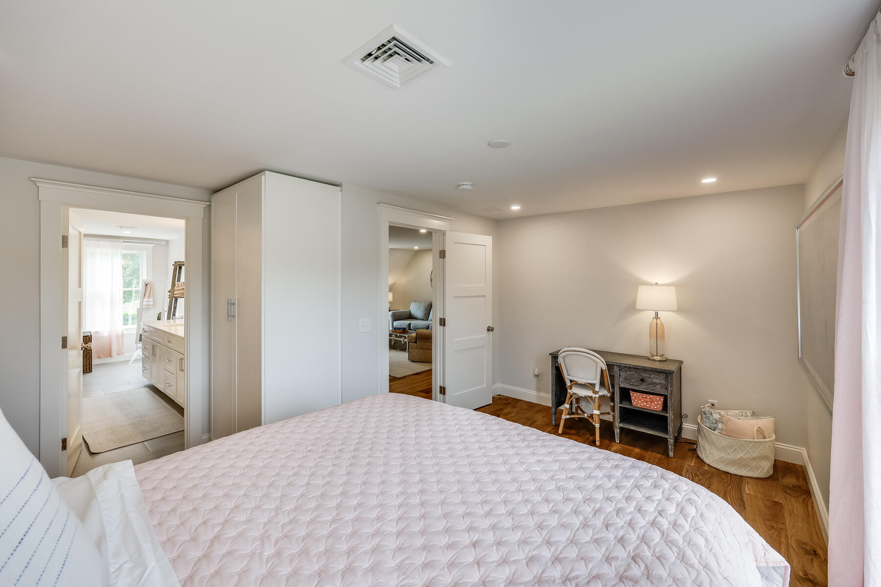 264 Tonset Road Orleans, MA 02653 - Photo 56 of 92 a bedroom with a bed and a large mirror