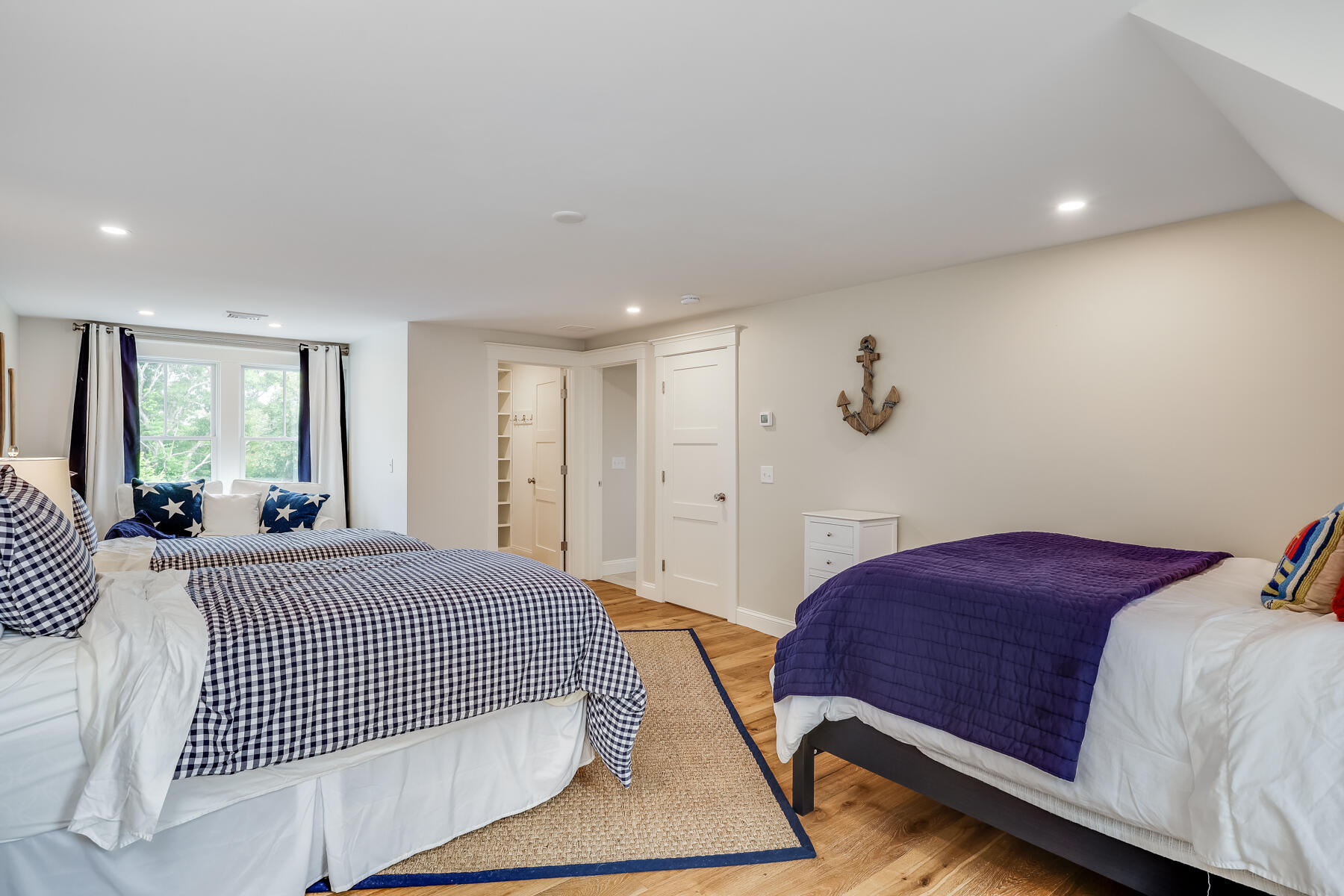 264 Tonset Road Orleans, MA 02653 - Photo 62 of 92 a bedroom with a bed and window
