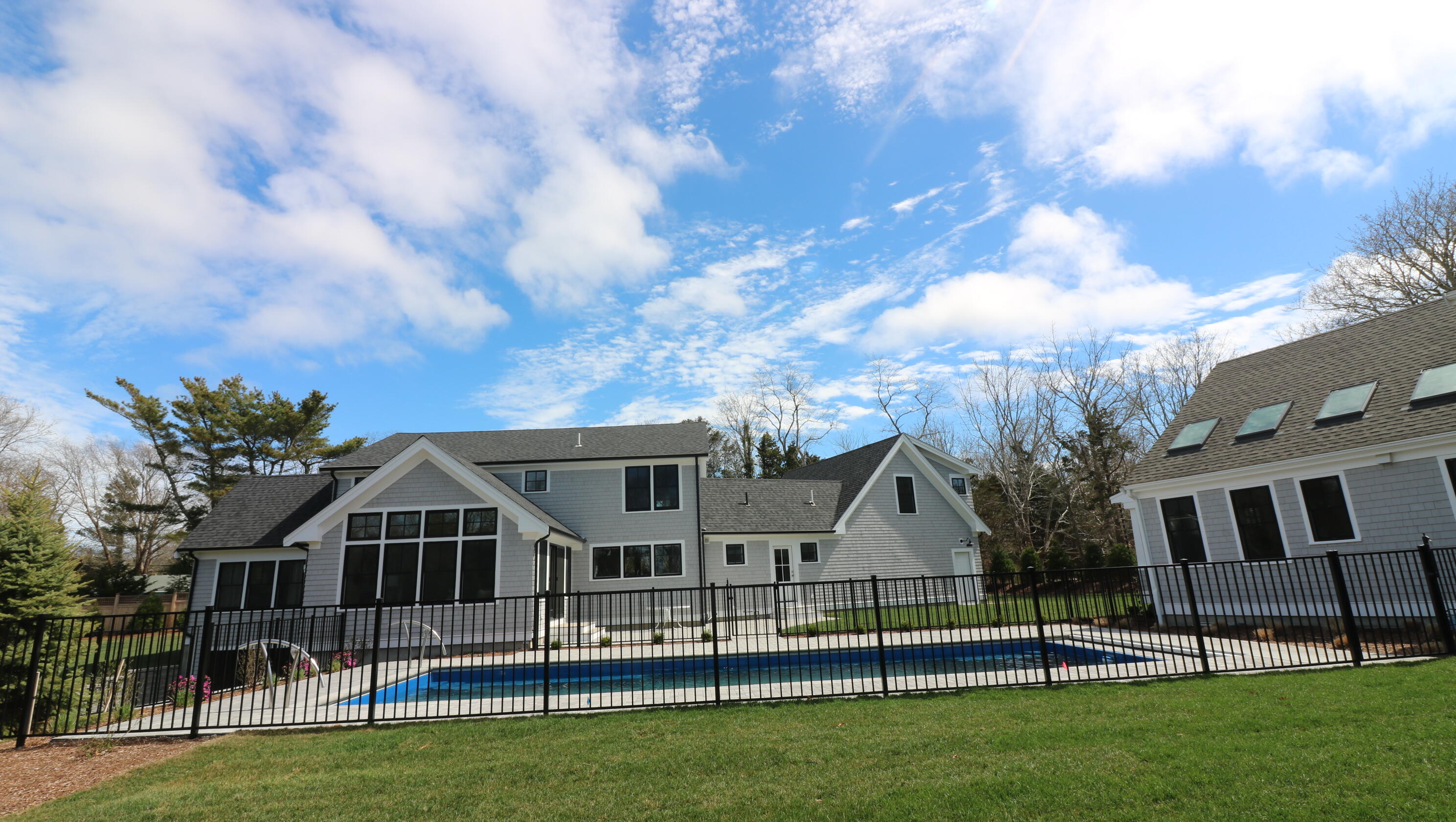 264 Tonset Road Orleans, MA 02653 - Photo 84 of 92 a front view of a house with a yard