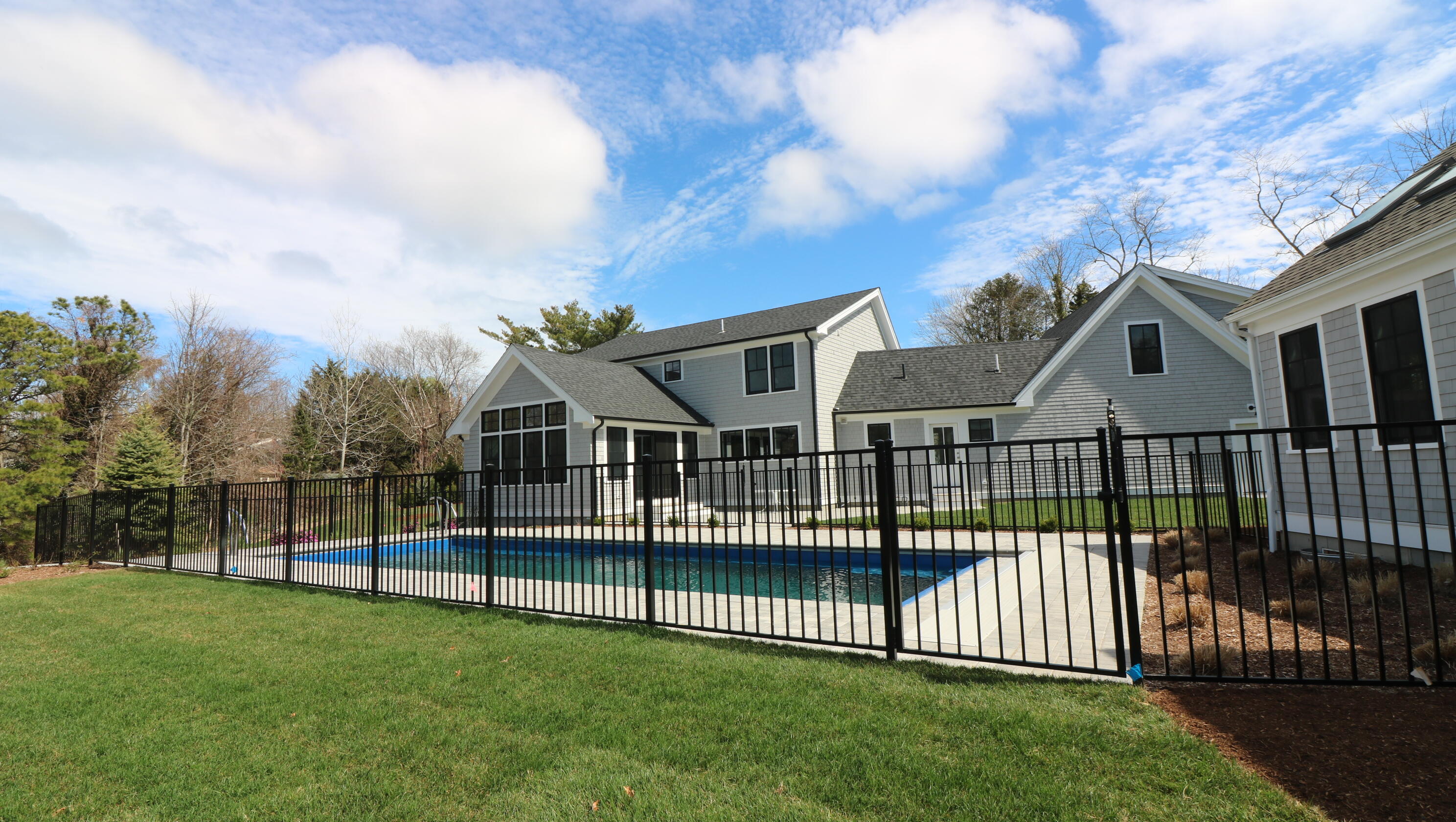 264 Tonset Road Orleans, MA 02653 - Photo 10 of 92 a view of a brick house in front of a big yard