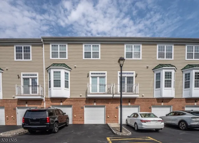 a car parked in front of a house