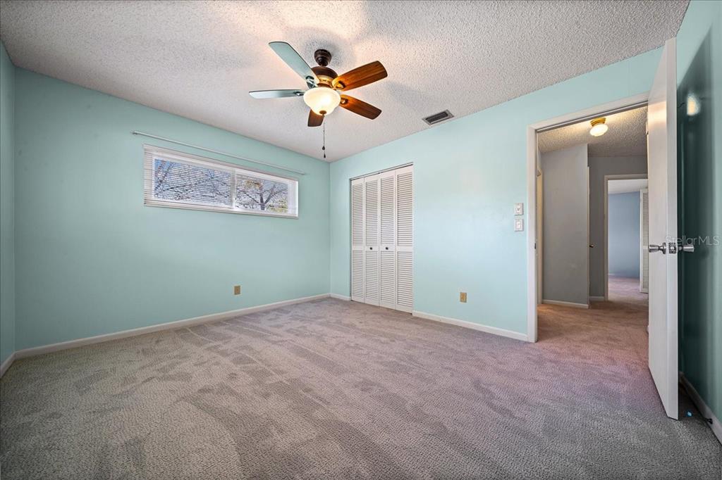 8702 Southwest 94 Street, Unit A Ocala, FL 34481 - Photo 17 of 55 a view of an empty room