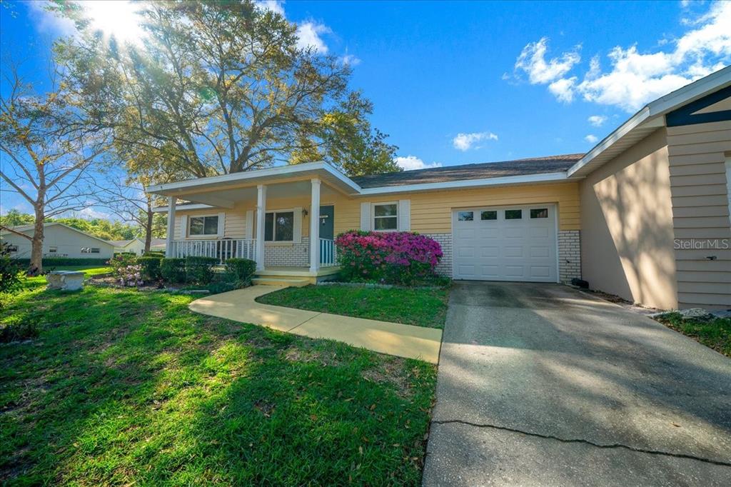 8702 Southwest 94 Street, Unit A Ocala, FL 34481 - Photo 42 of 55 a view of a house with yard