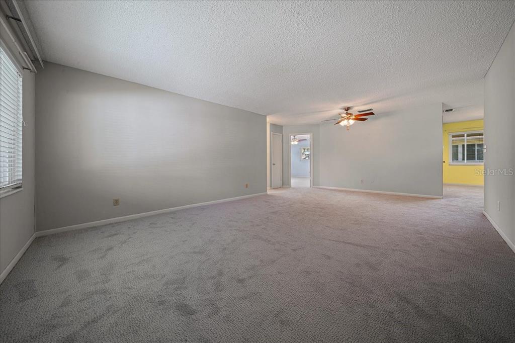 8702 Southwest 94 Street, Unit A Ocala, FL 34481 - Photo 7 of 55 a view of empty room