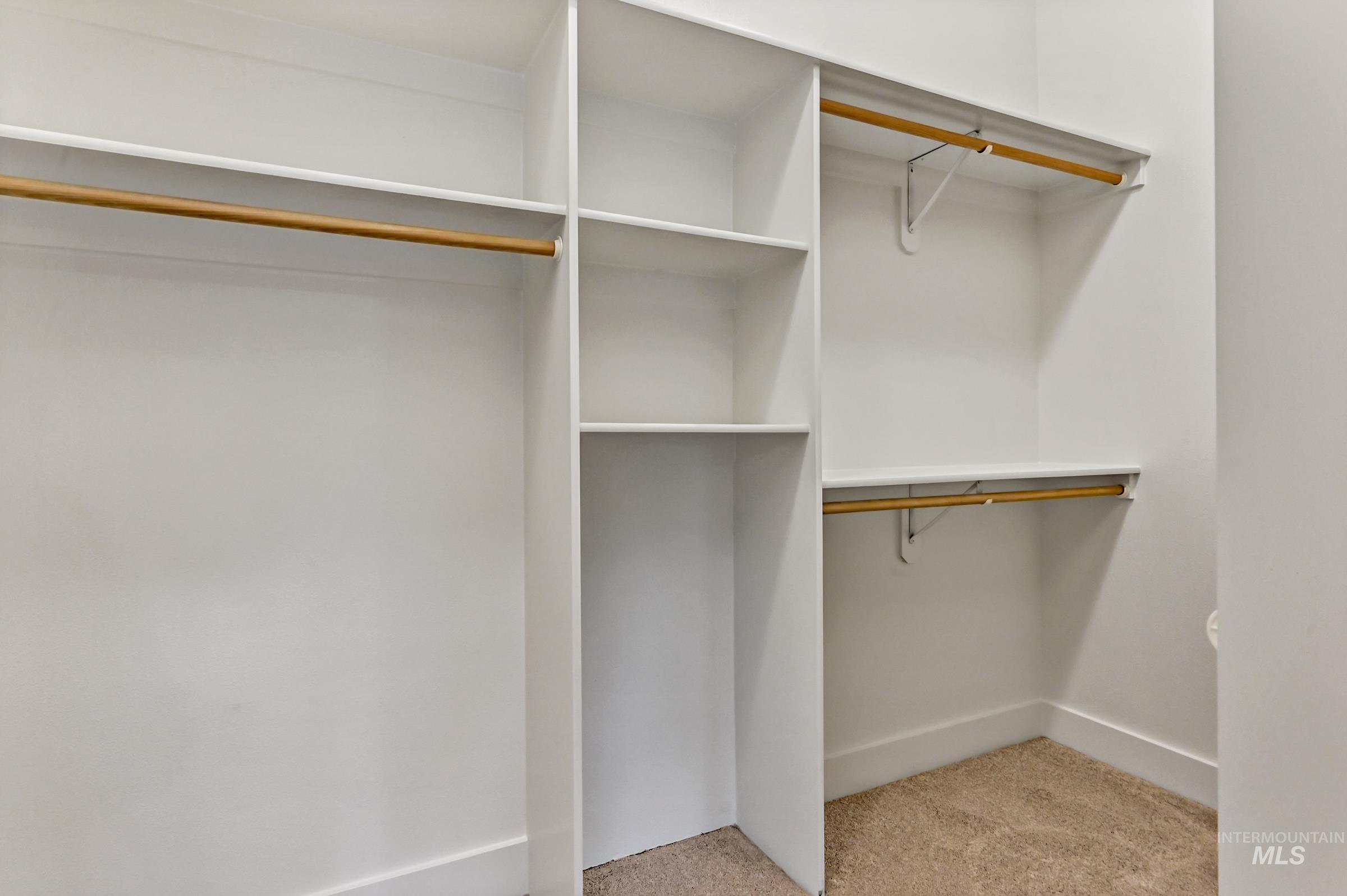 2476 North Bogus Basin Road Boise, ID 83702 - Photo 23 of 48 Walk-in closet with built-in shelving and ample storage. Organized and functional layout.