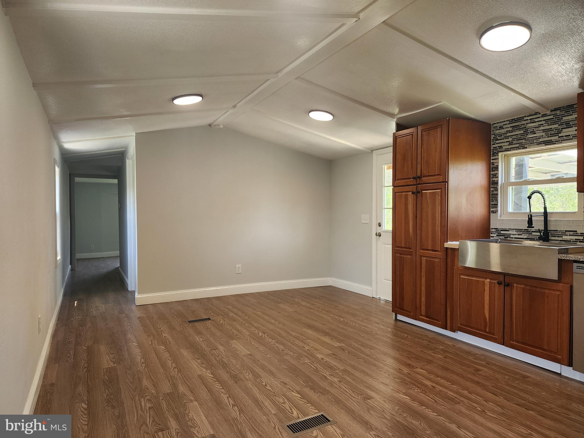 41 Mountain View Terrace Newville, PA 17241 - Photo 17 of 34 an empty room with wooden floor and entrance