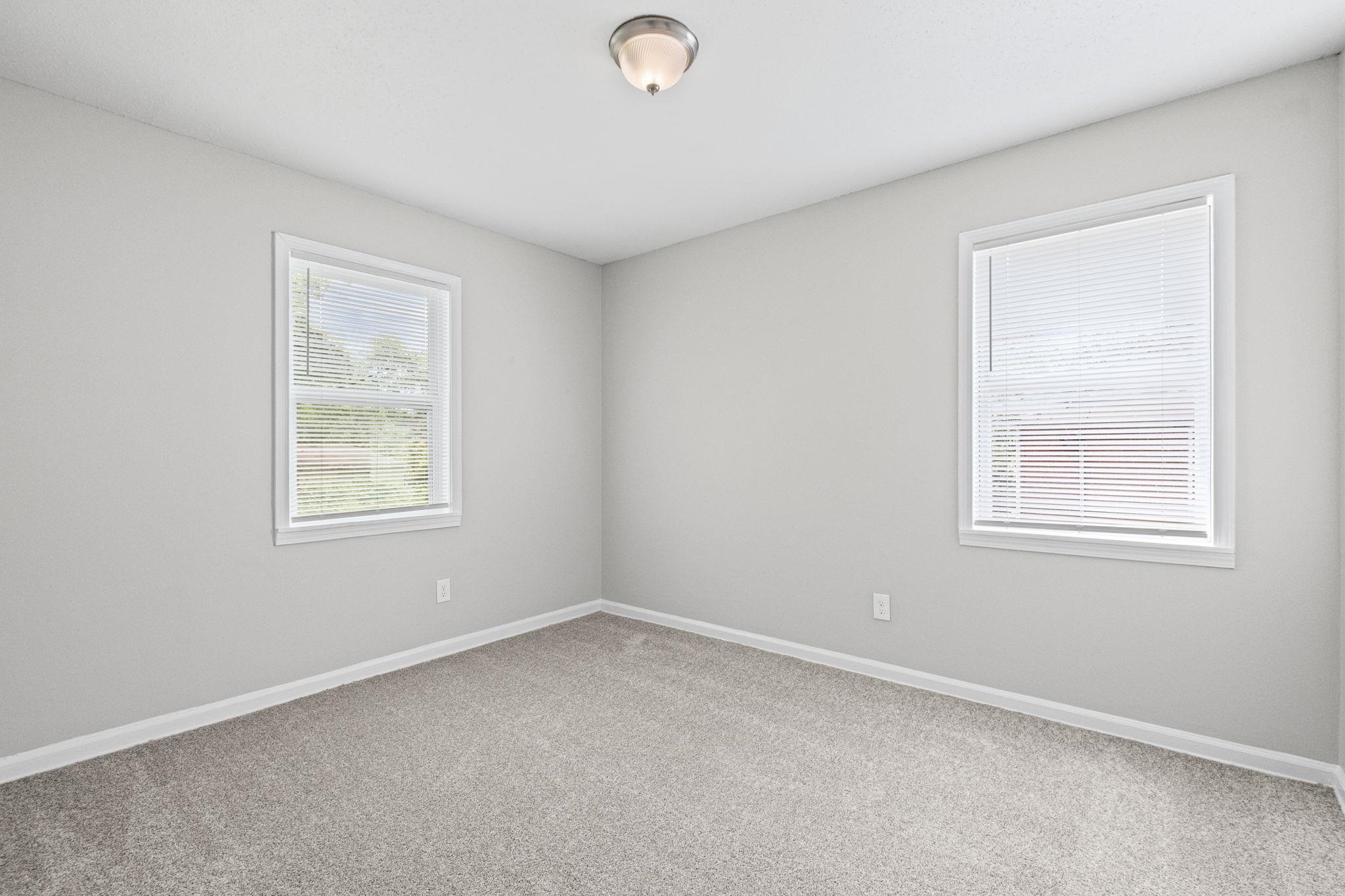 3580 Ramill Road Memphis, TN 38128 - Photo 12 of 24 Empty room featuring carpet flooring and baseboards