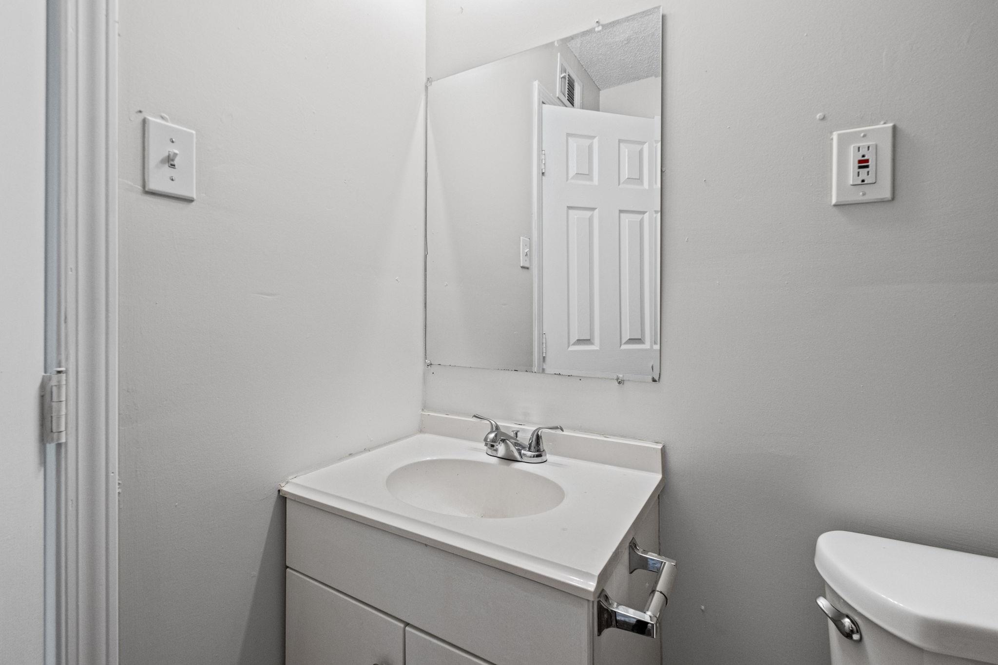 3580 Ramill Road Memphis, TN 38128 - Photo 13 of 24 Half bath with toilet and vanity