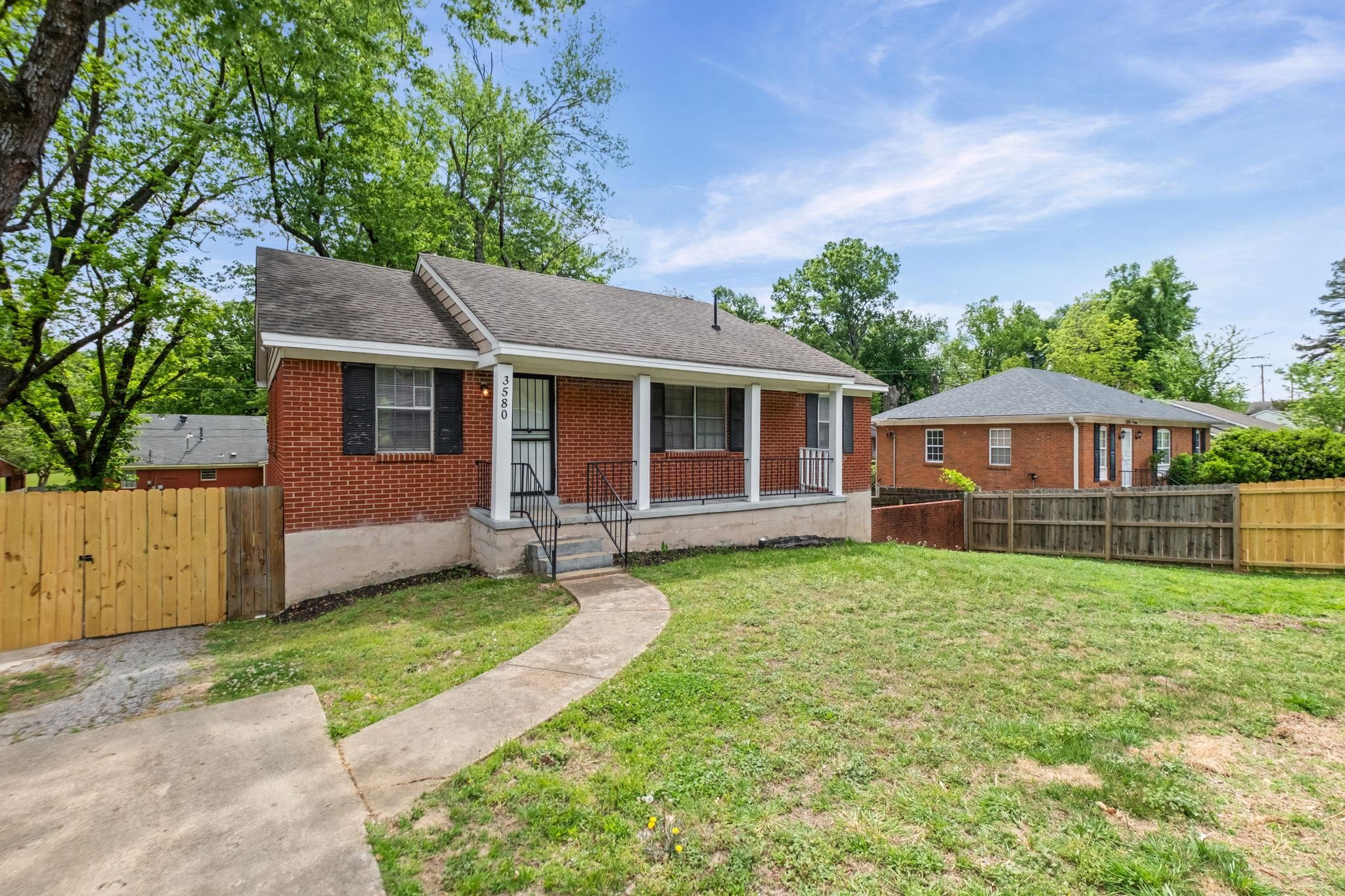 3580 Ramill Road Memphis, TN 38128 - Photo 2 of 24 Bungalow-style house with a porch, a shingled roof, and brick siding