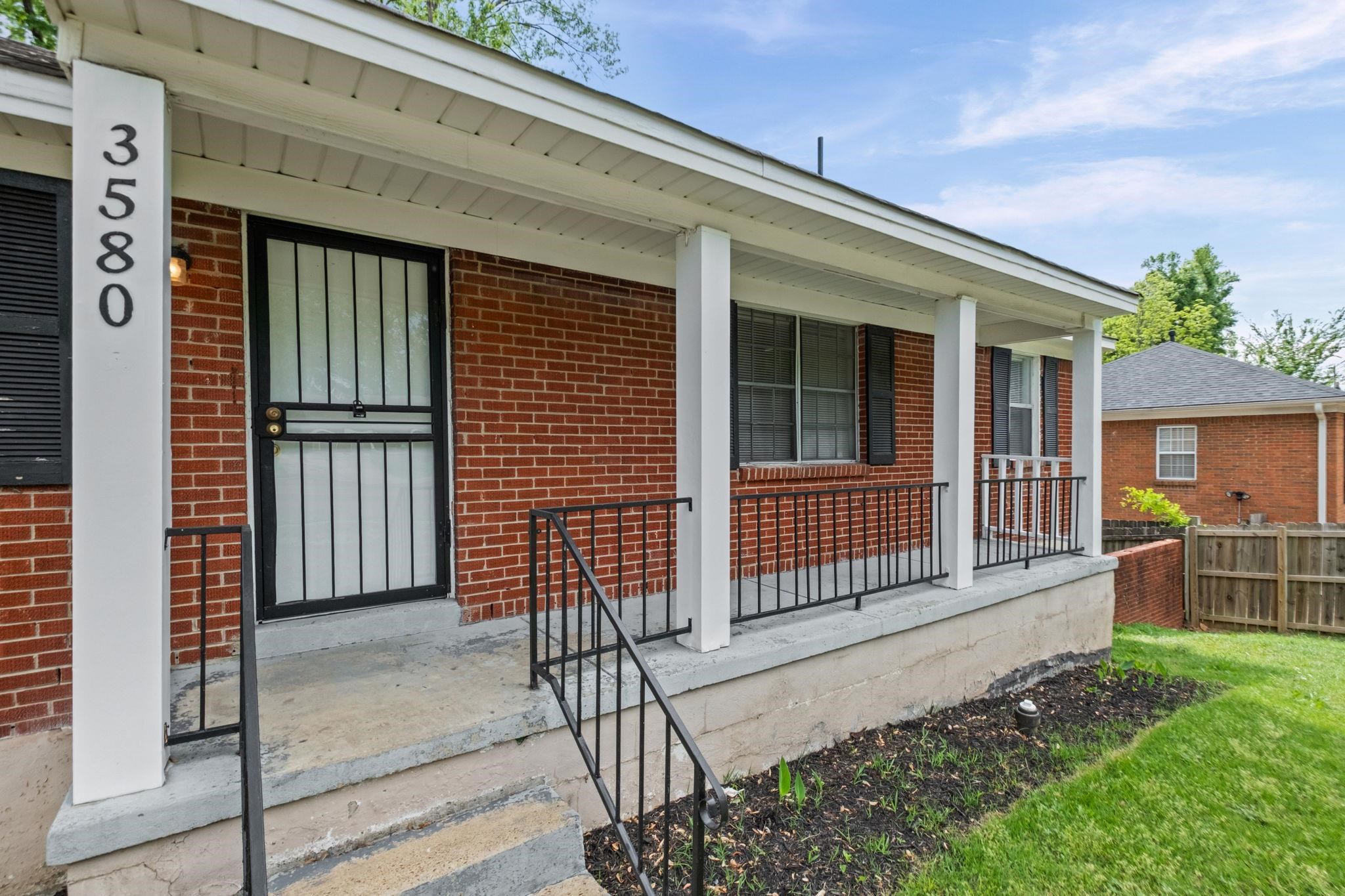 3580 Ramill Road Memphis, TN 38128 - Photo 3 of 24 Doorway to property featuring a porch and brick siding
