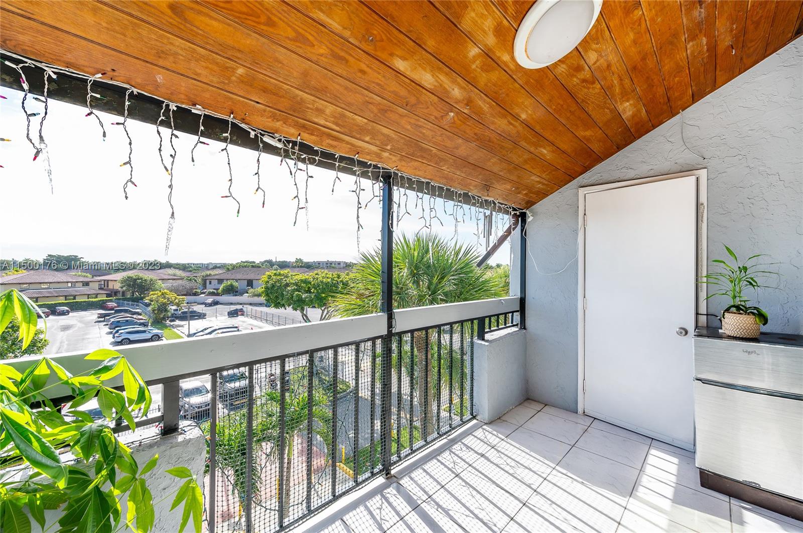 12239 Southwest 14th Lane, Unit 3401 Miami, FL 33184 - Photo 19 of 23 a view of a balcony with lake view