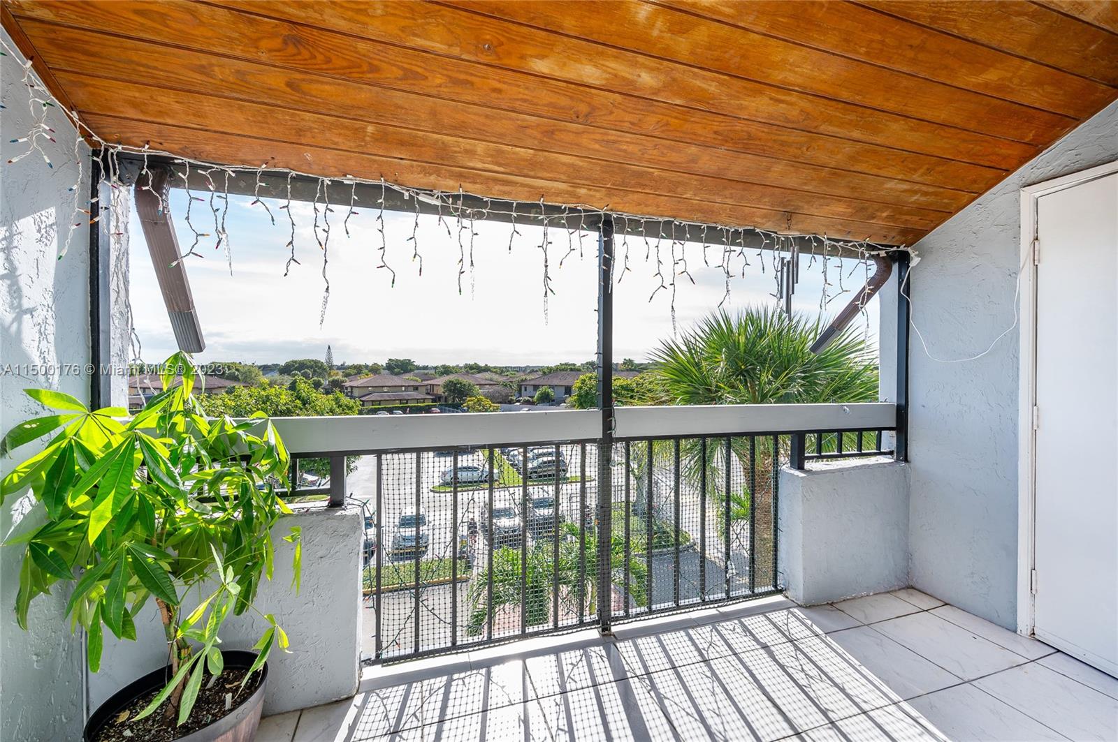 12239 Southwest 14th Lane, Unit 3401 Miami, FL 33184 - Photo 4 of 23 a balcony with outdoor space