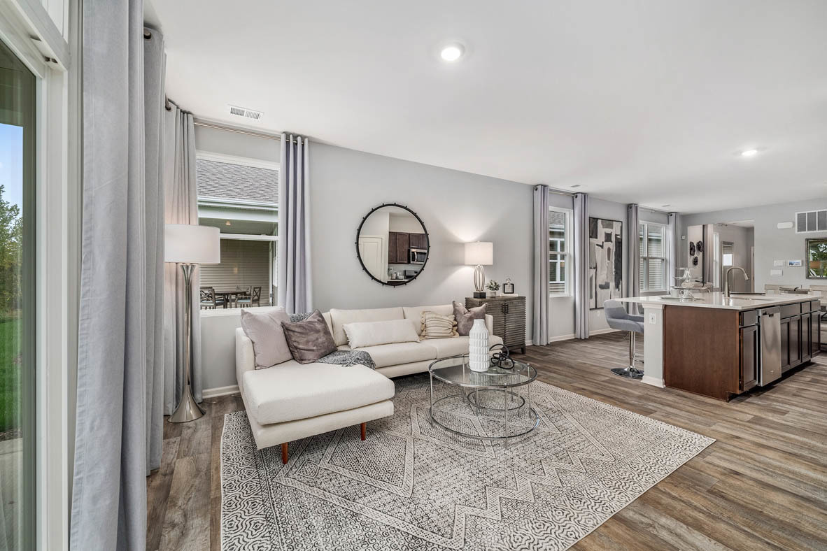 890 Eineke Boulevard Algonquin, IL 60102 - Photo 15 of 27 a living room with furniture and a wooden floor