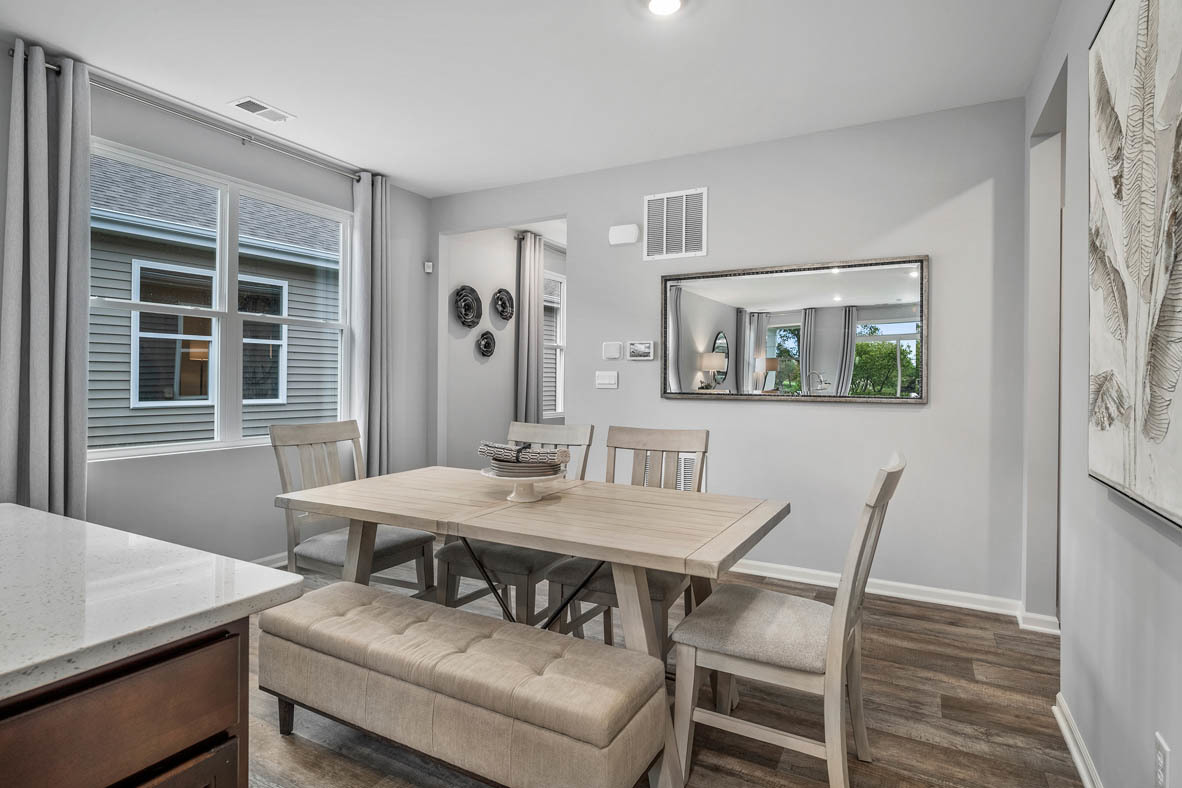 890 Eineke Boulevard Algonquin, IL 60102 - Photo 10 of 27 a view of a dining room with furniture and window