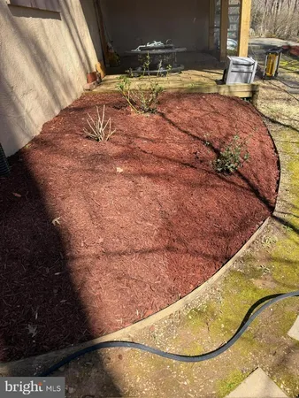 a view of a swimming pool with a yard