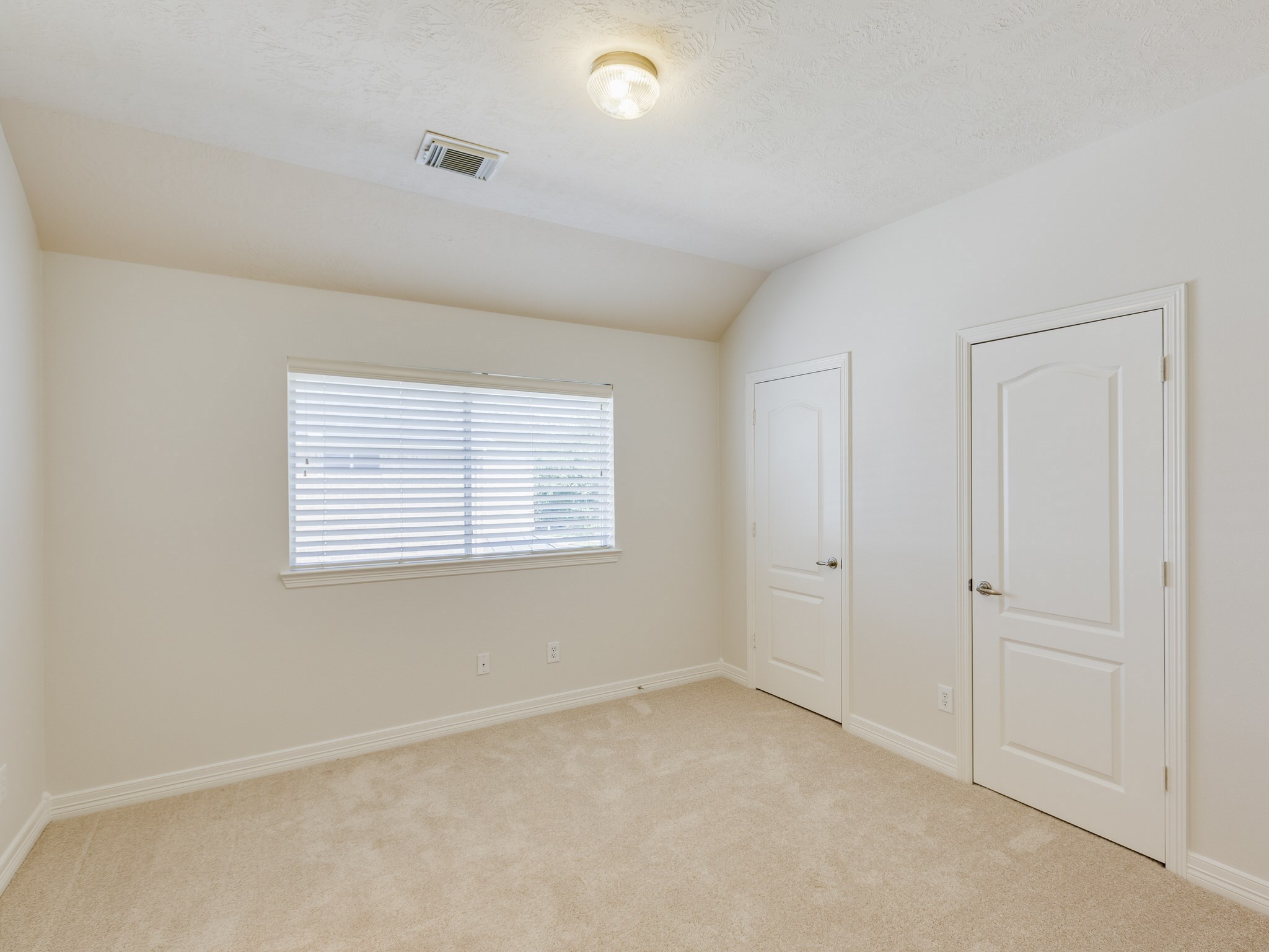6327 Collina Springs Court Houston, TX 77041 - Photo 23 of 35 an empty room with a window