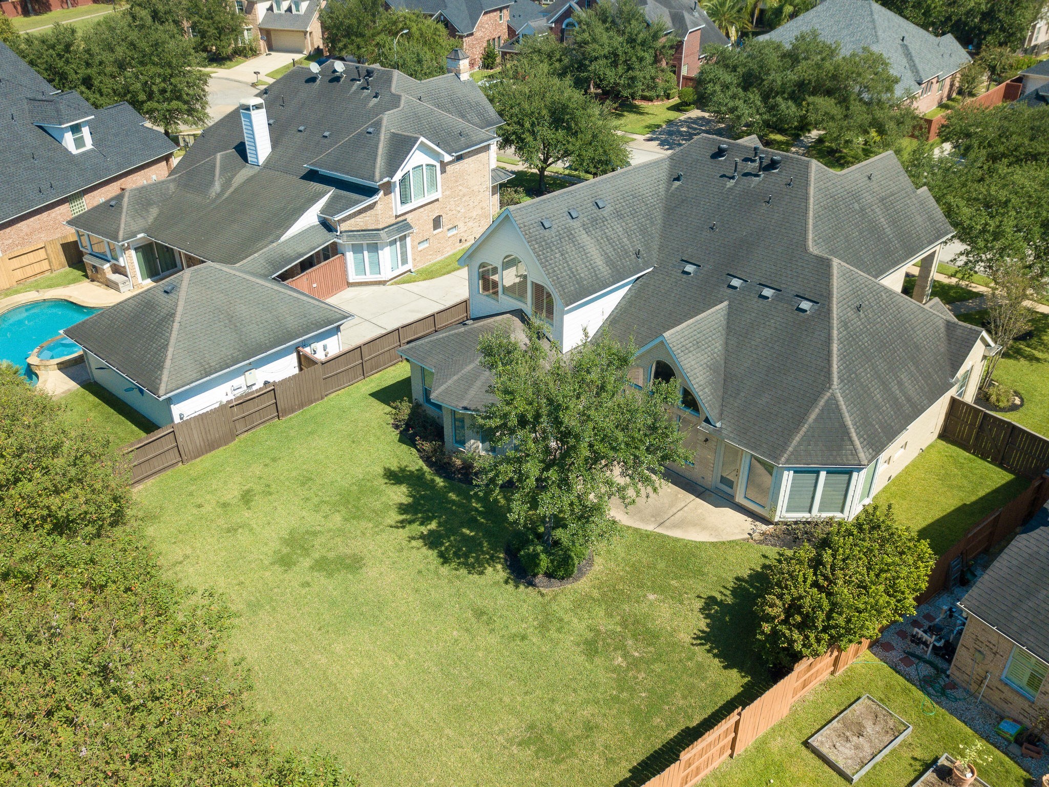 6327 Collina Springs Court Houston, TX 77041 - Photo 3 of 35 an aerial view of residential house with outdoor space and swimming pool