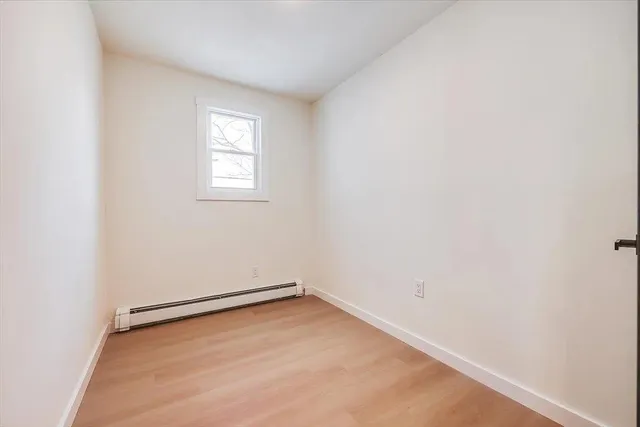 an empty room with a window