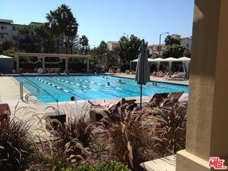 12963 West Runway Road, Unit 221 Playa Vista, CA 90094 - Photo 13 of 20 a view of a yard with table and chairs