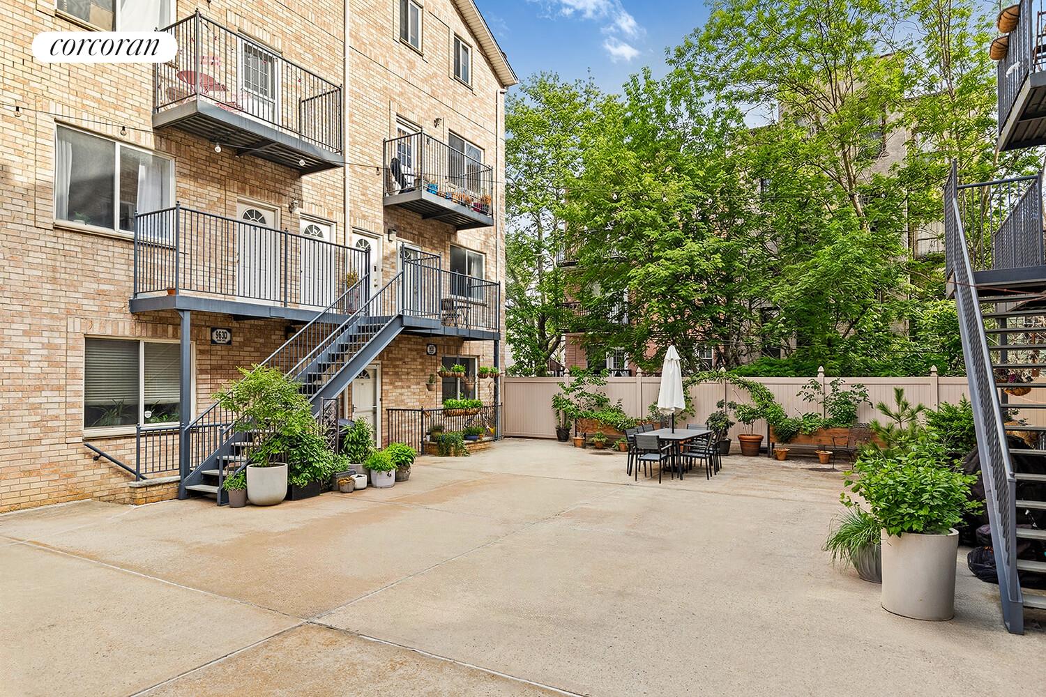 963 Kent Avenue, Unit D2 Brooklyn, NY 11205 - Photo 8 of 9 a car parked on the side of a street