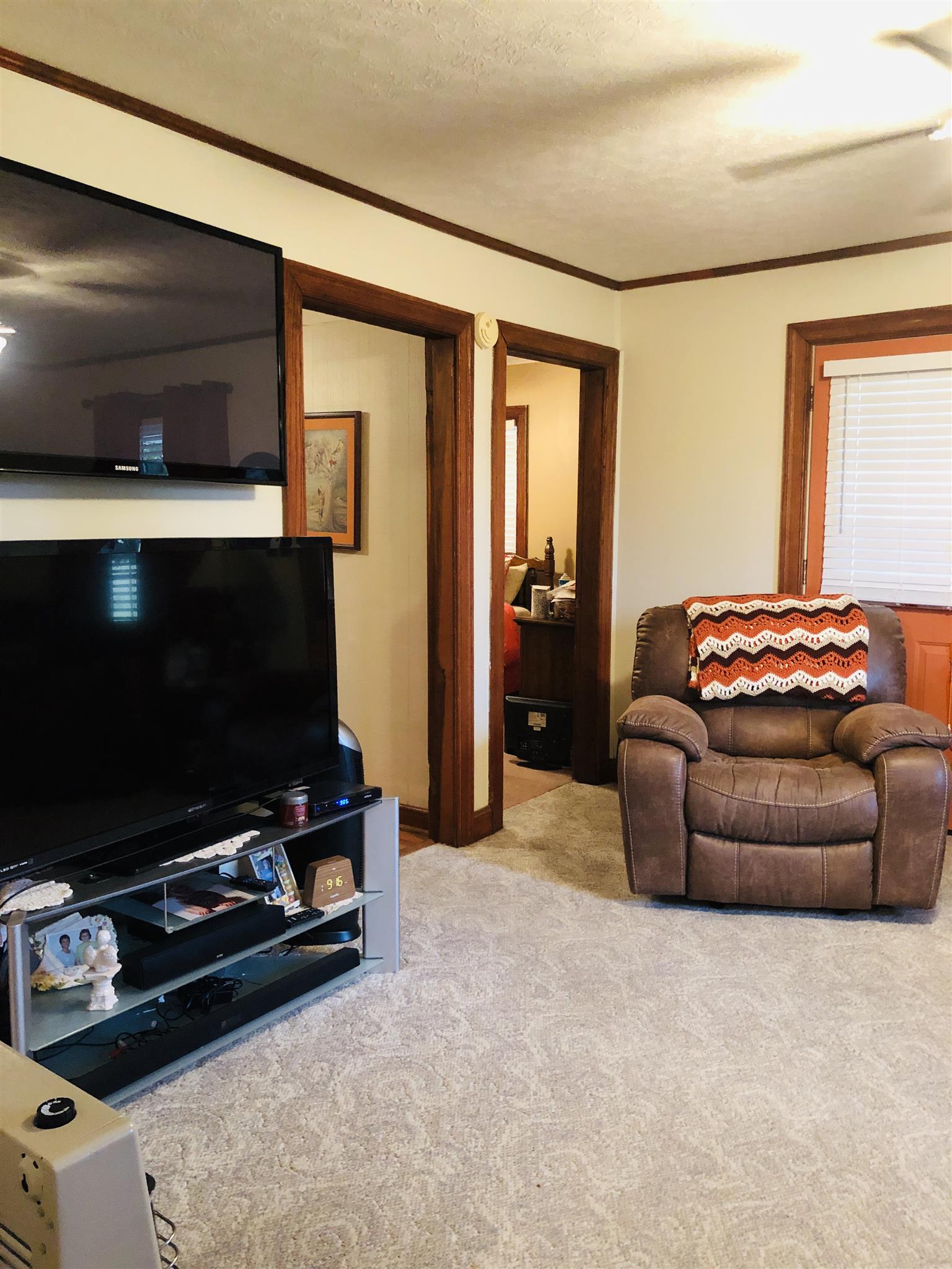 739 Winklers Road Red Boiling Springs, TN 37150 - Photo 13 of 20 Living room located on the front of the house that leads to a quaint little covered porch