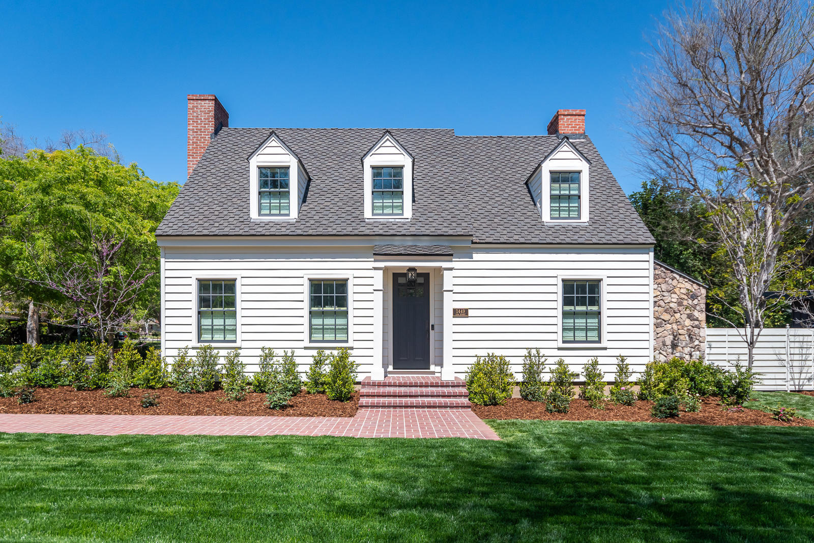 1449 Lida Street Pasadena, CA 91103 - Photo 1 of 35 a front view of a house with a yard