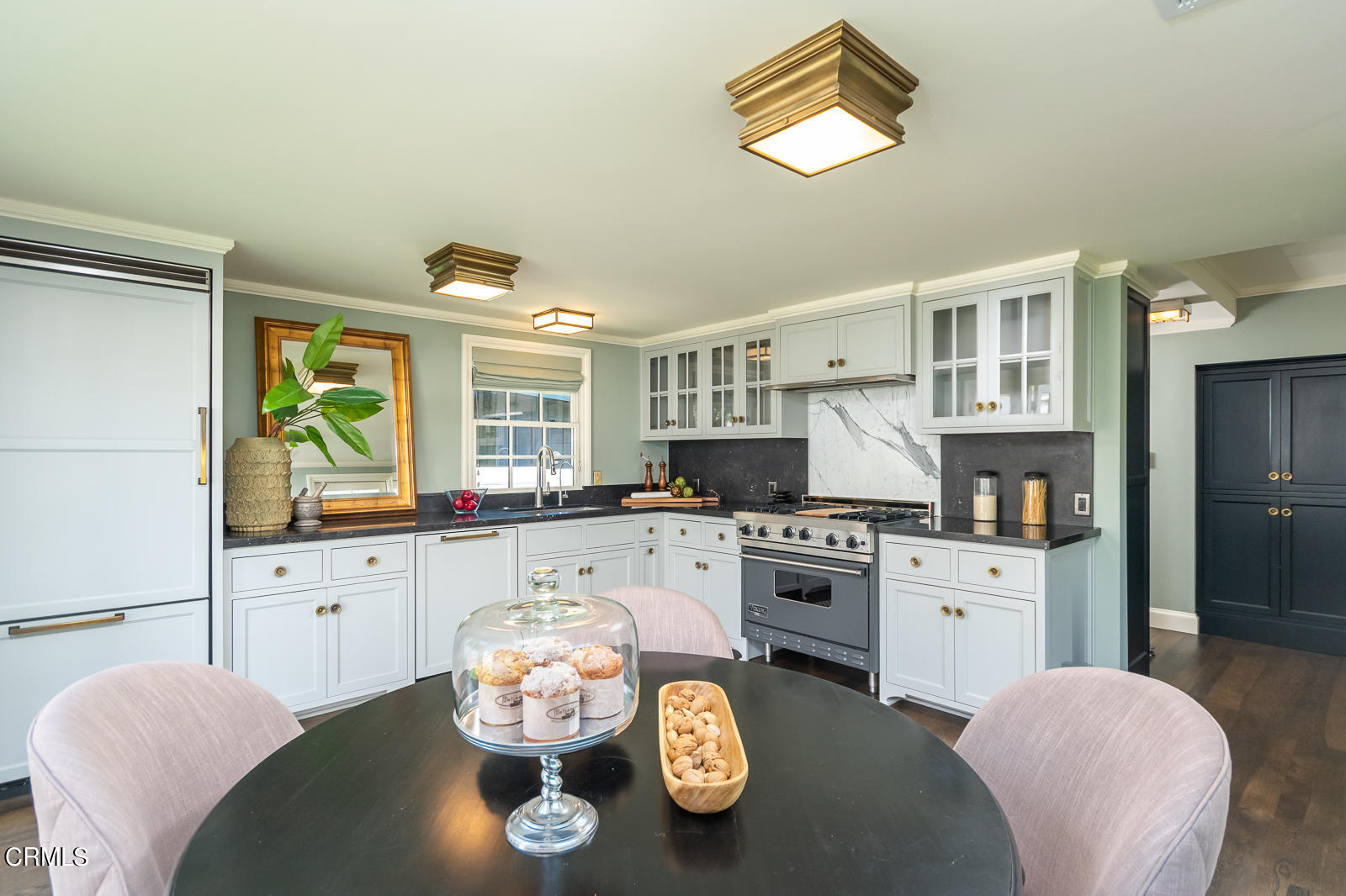 1449 Lida Street Pasadena, CA 91103 - Photo 11 of 35 a living room with stainless steel appliances furniture a chandelier and a dining table
